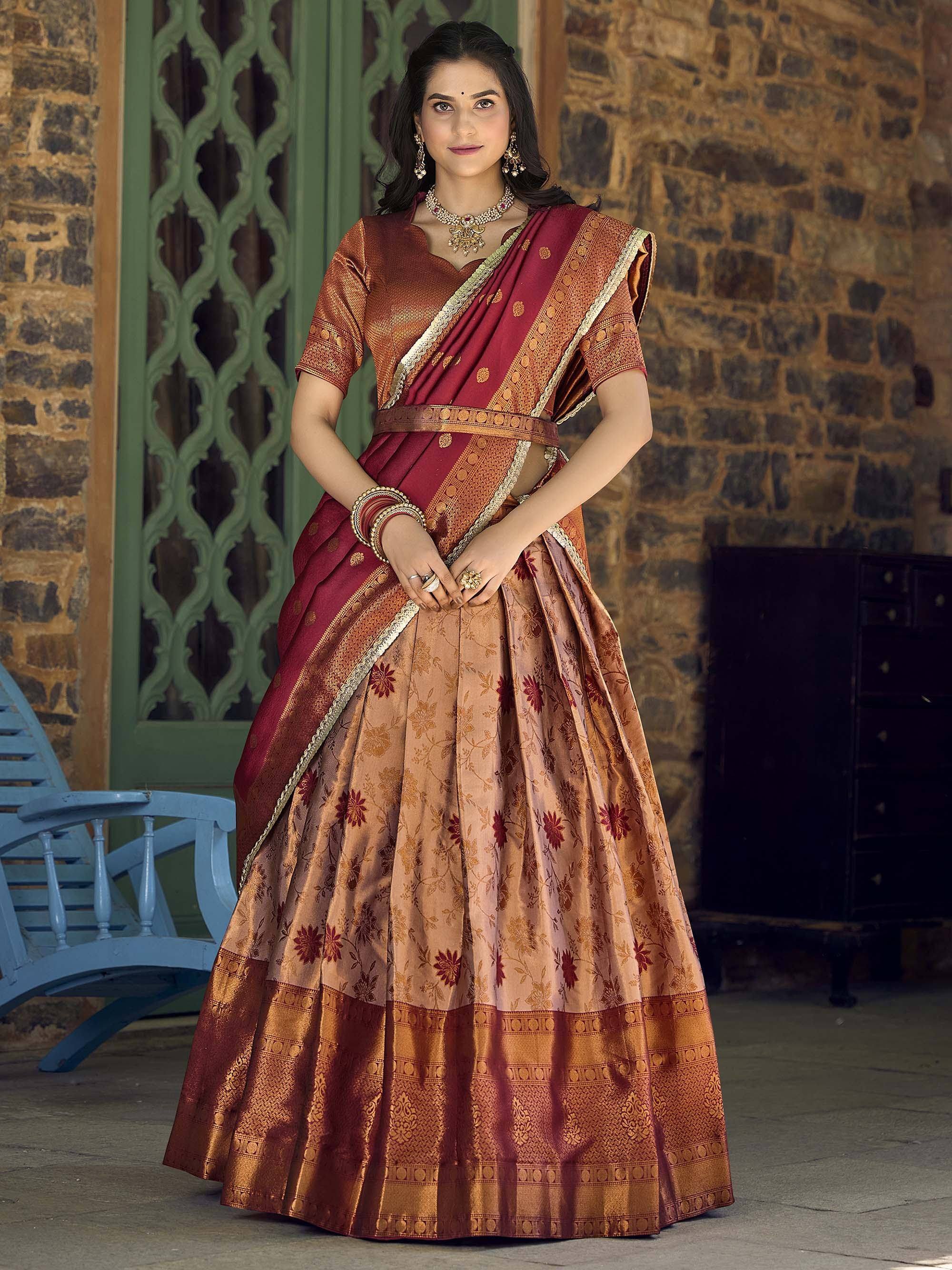 Elegant maroon and gold designer lehenga choli with floral print, perfect for Indian ethnic wear occasions