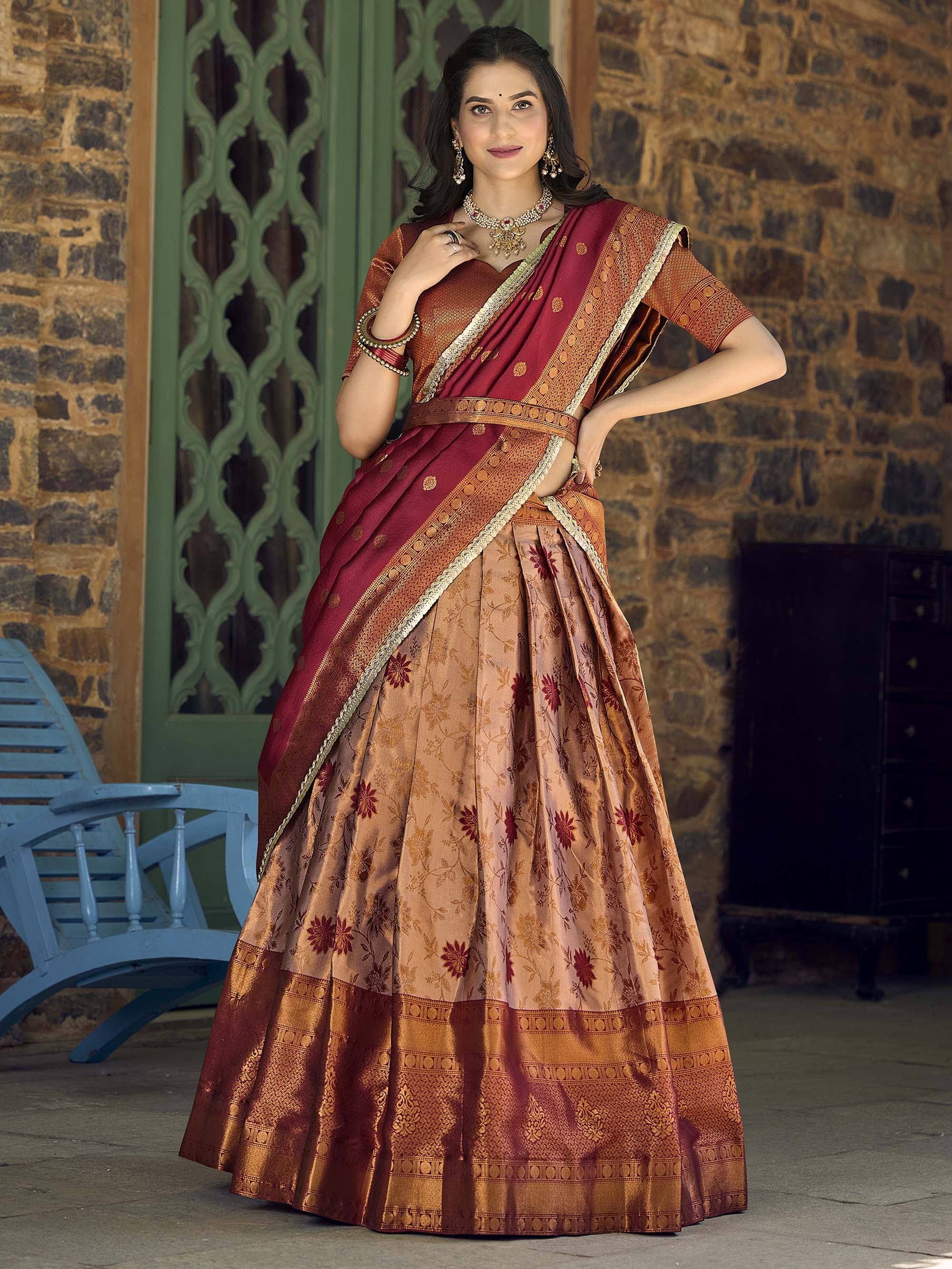 Elegant maroon and gold designer lehenga choli with floral print, perfect for Indian ethnic occasions