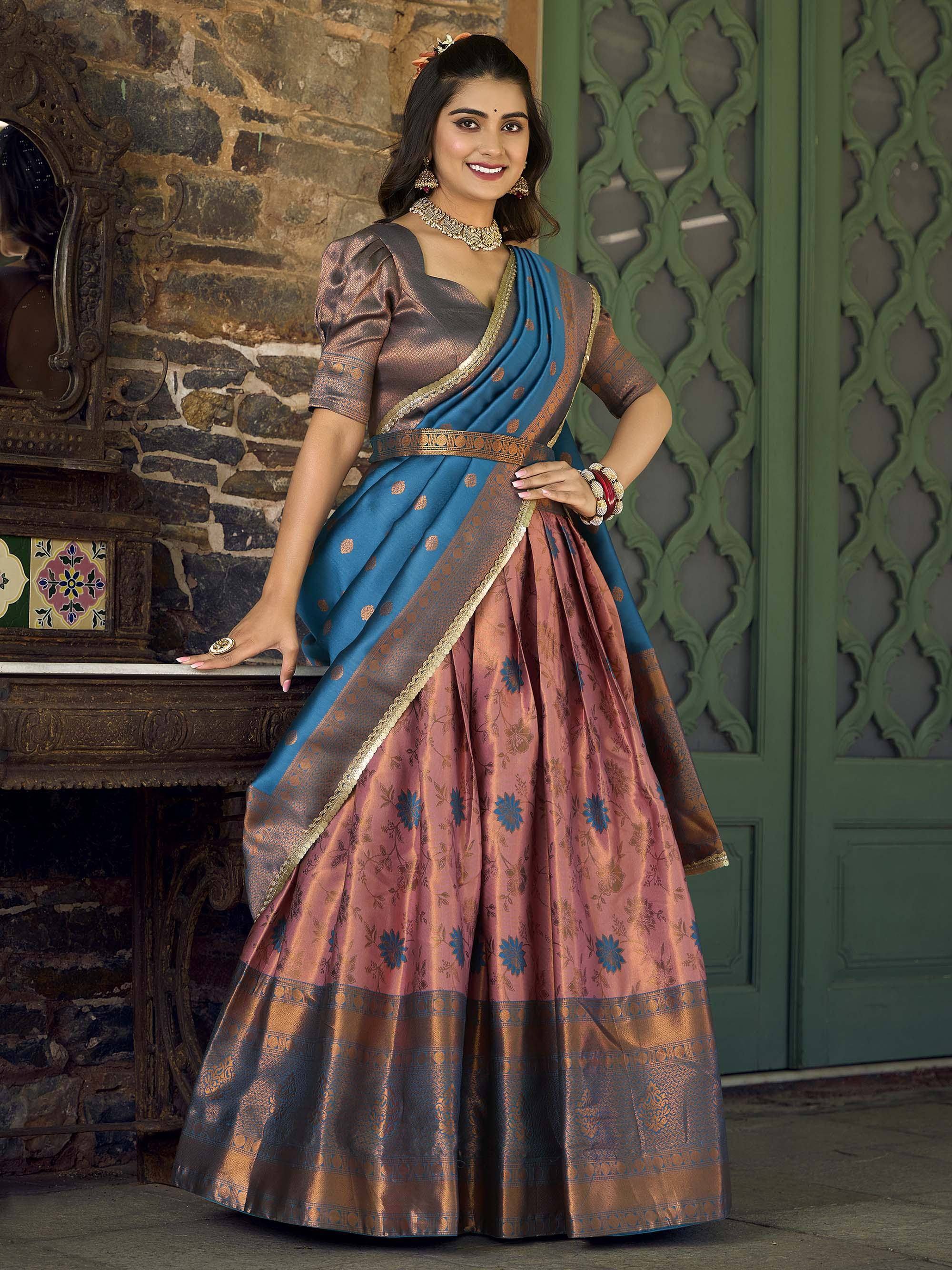 Elegant blue and pink floral lehenga choli with gold detailing, perfect for Indian ethnic wear.