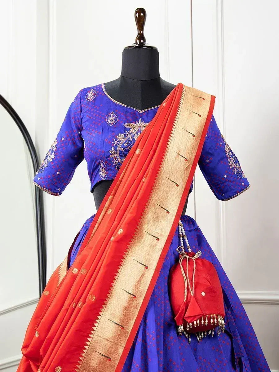 Blue embroidered lehenga choli with red dupatta and potli bag, Indian ethnic wear