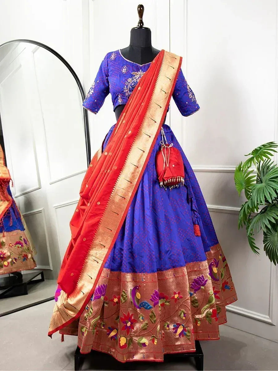 Royal blue lehenga choli with red dupatta, floral embroidery, and peacock motifs for Indian ethnic wear