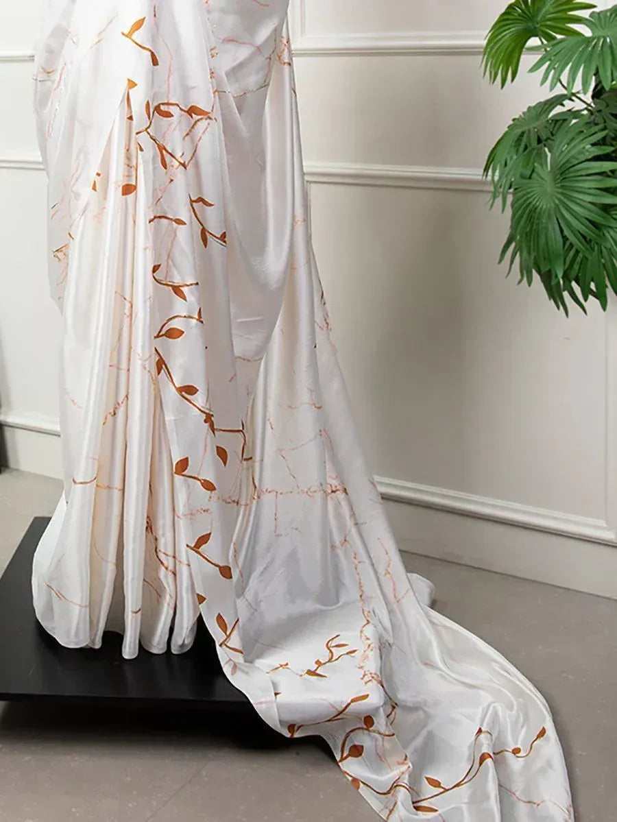 White satin saree with gold leaf embroidery, elegant ethnic wear for women