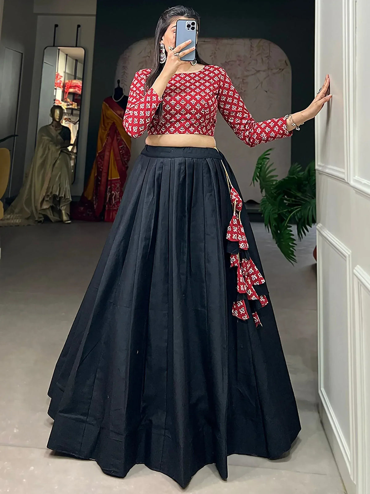 Red printed crop top with black pleated lehenga skirt, Indian ethnic wear for women