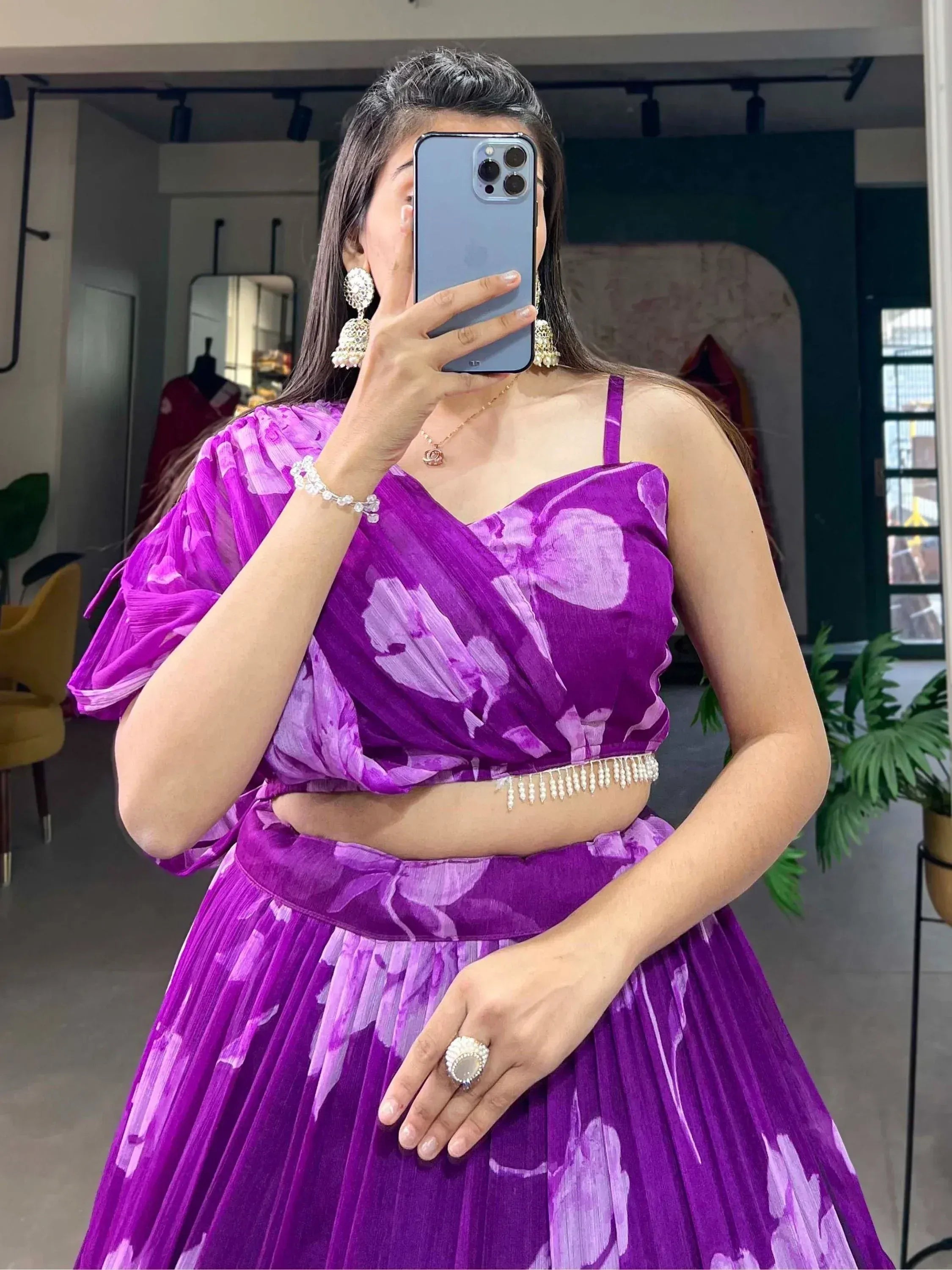 Purple floral lehenga choli with pearl belt, perfect for Indian ethnic wear occasions