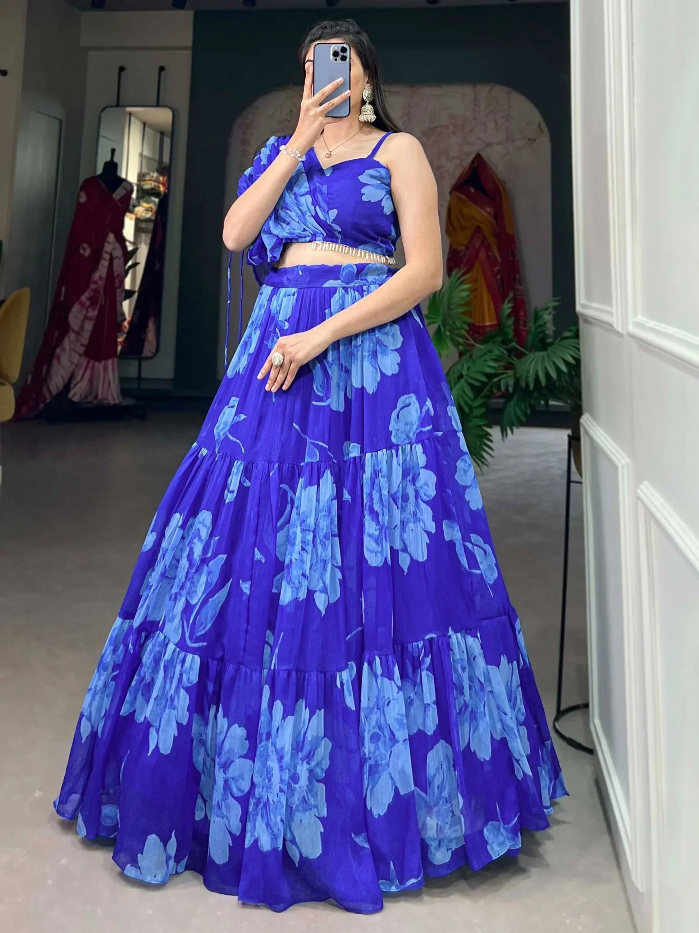 Blue floral lehenga choli with tiered skirt, perfect for Indian ethnic wear events