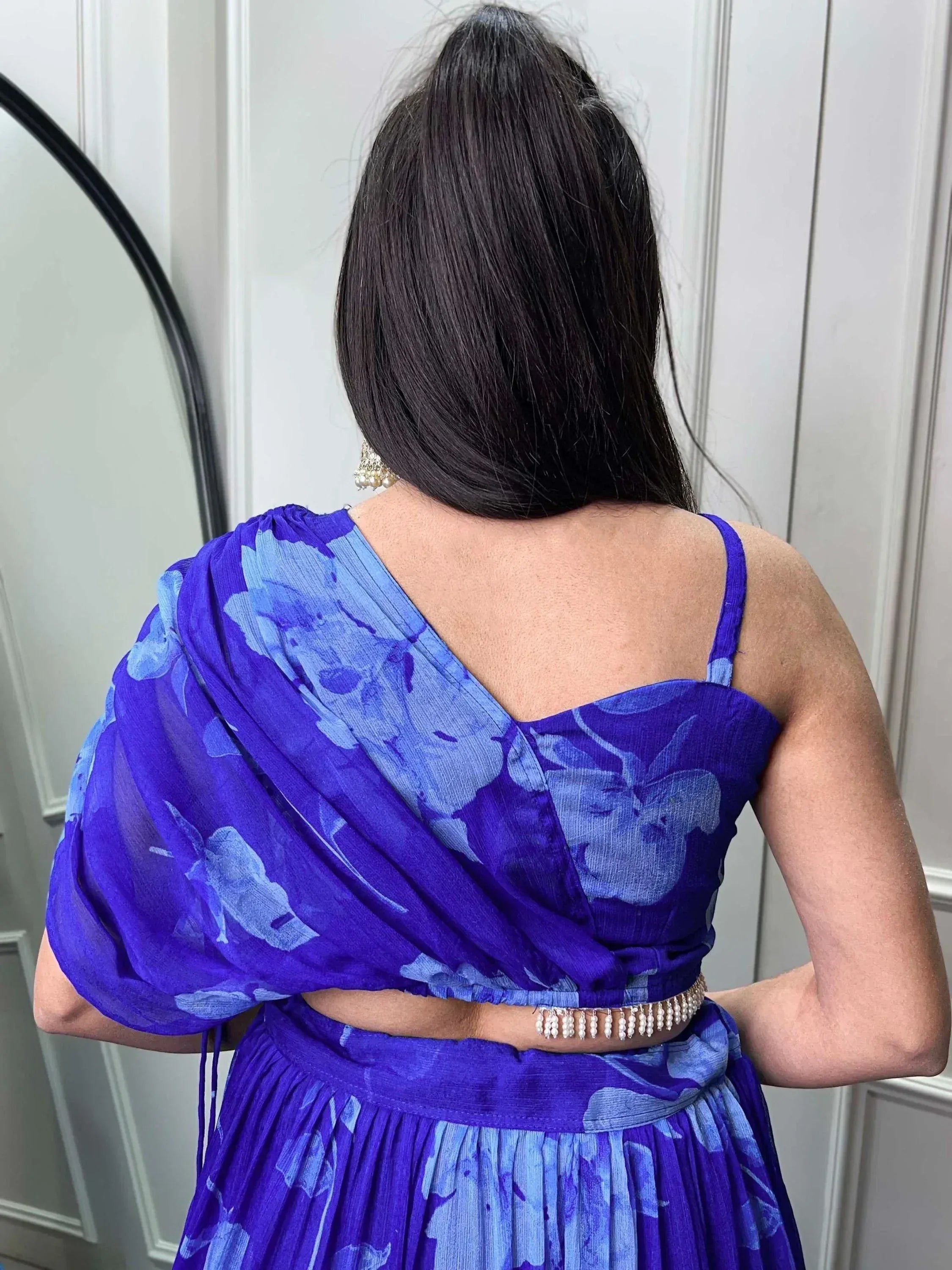 Purple floral ethnic gown with pearl belt, back view, perfect for Indian occasions