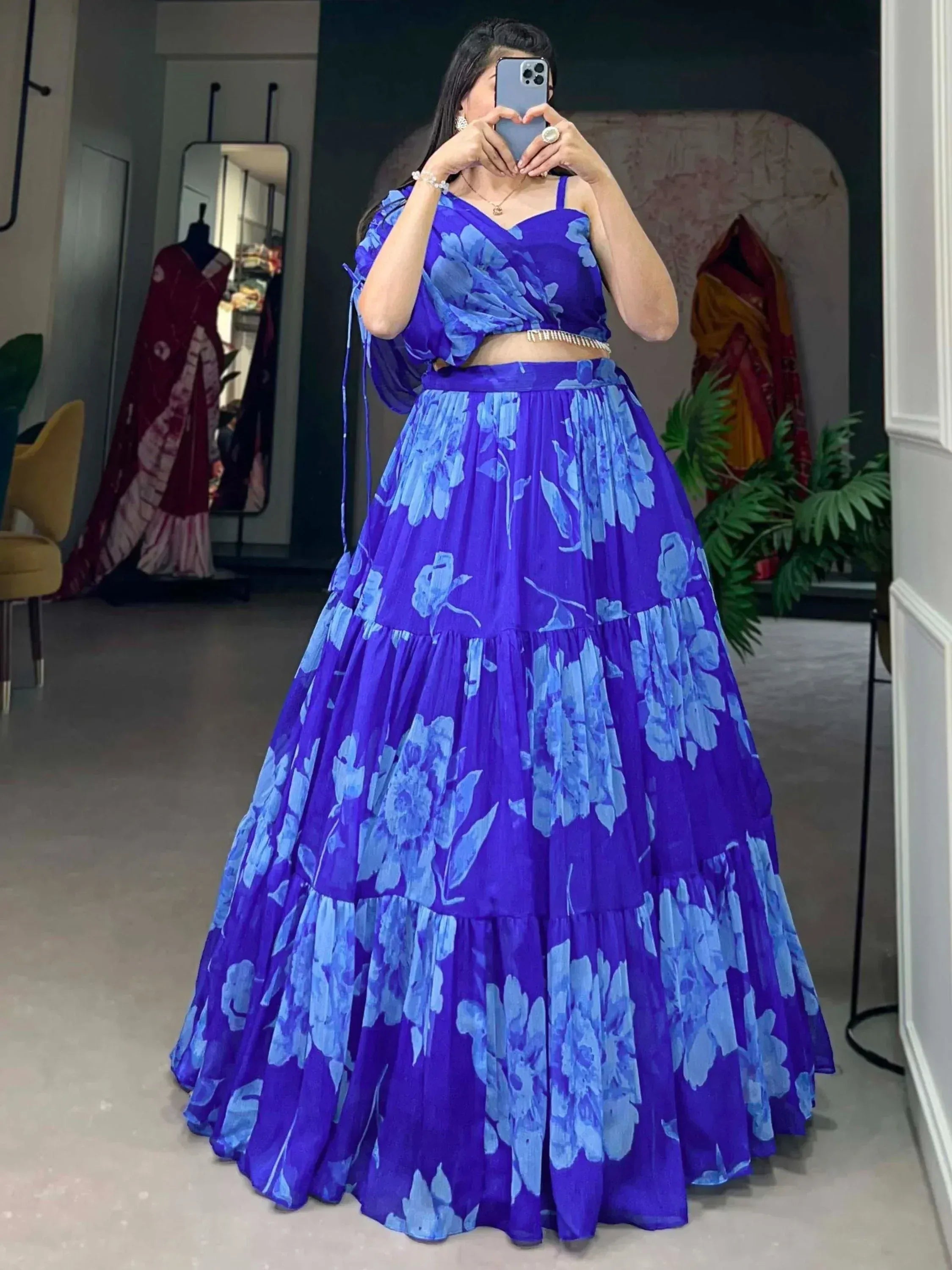 Blue floral lehenga choli with tiered skirt, perfect for Indian ethnic wear occasions