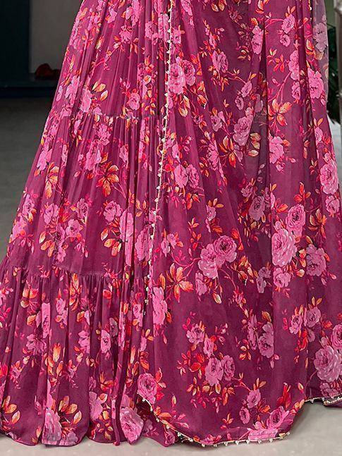Pink floral printed lehenga skirt with ruffled layers and delicate embroidery trim