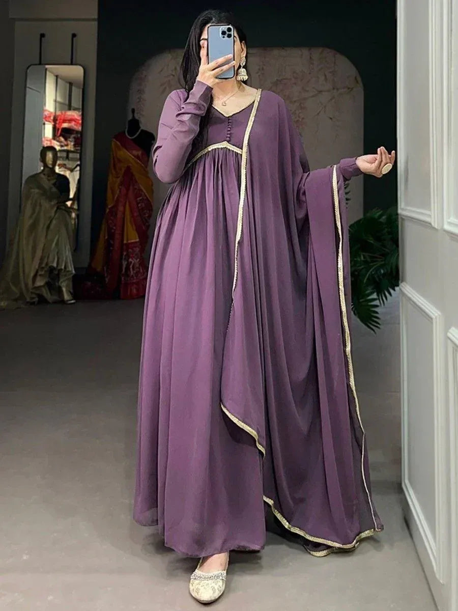 Purple ethnic gown with gold trim, perfect for Indian occasions and festive wear