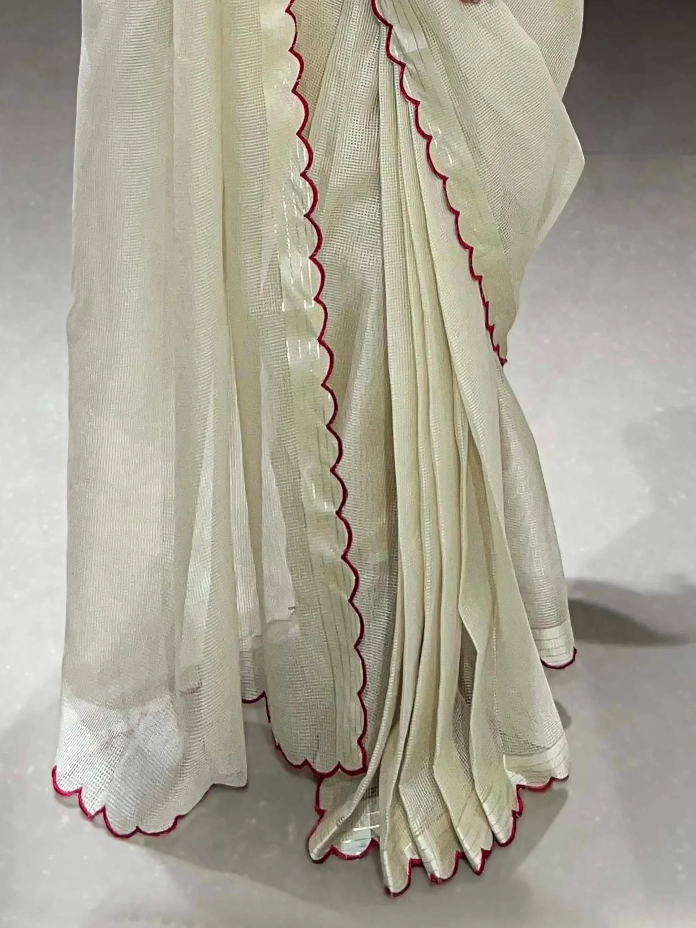 Cream saree with red scalloped border, lightweight ethnic wear for women
