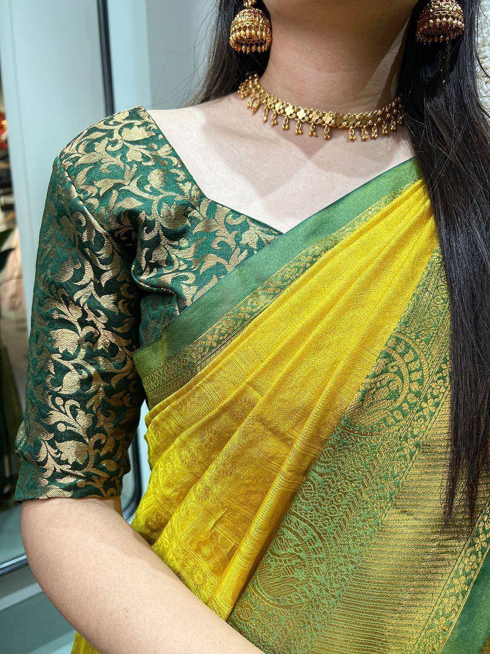 Yellow and green ethnic saree with gold floral blouse, traditional Indian wear