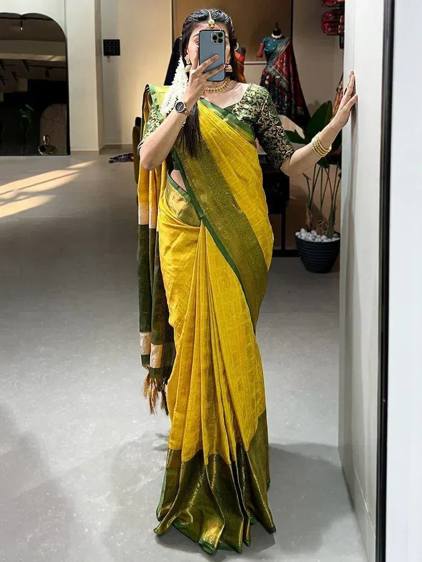 Yellow and green designer saree with embroidered blouse, perfect for ethnic occasions