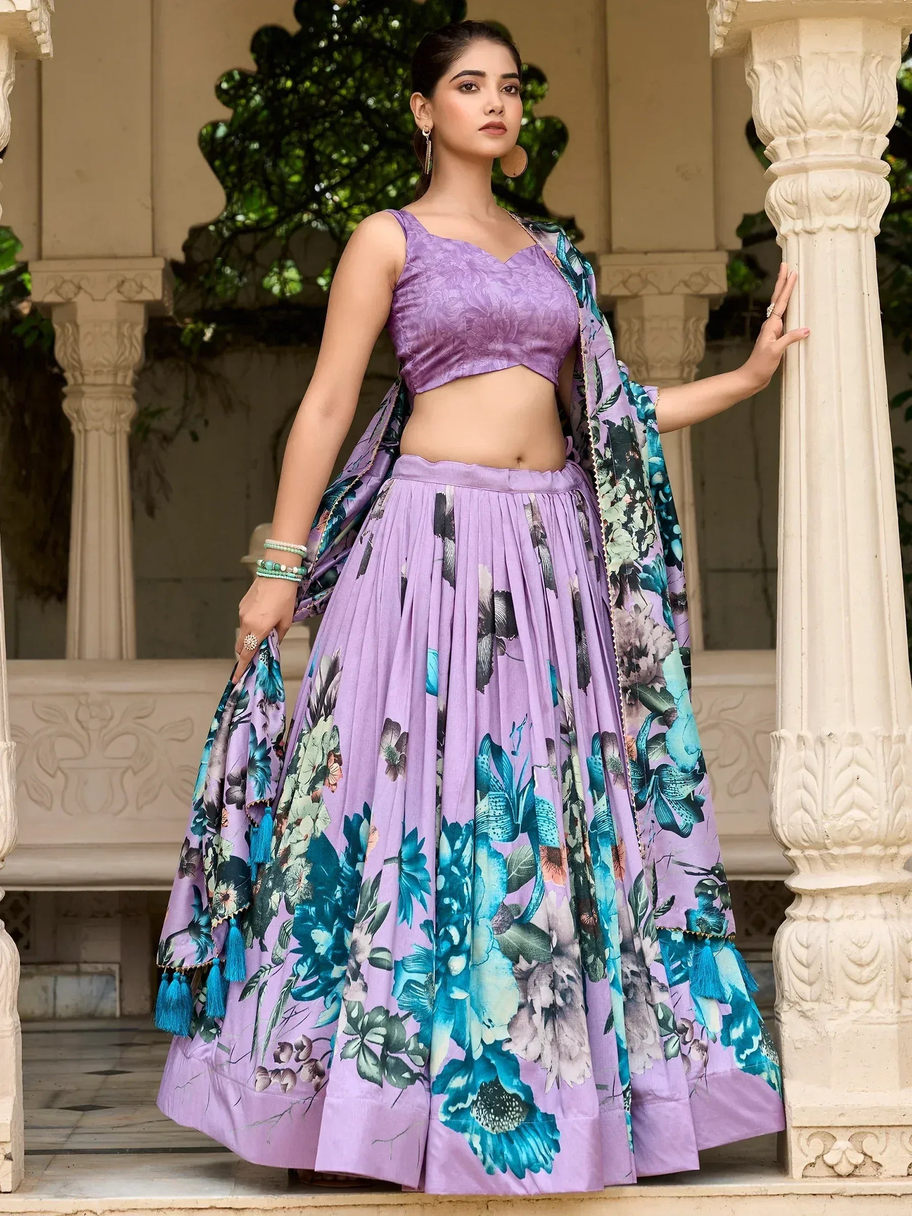 Purple floral lehenga choli with blue-green print, perfect for Indian ethnic wear occasions