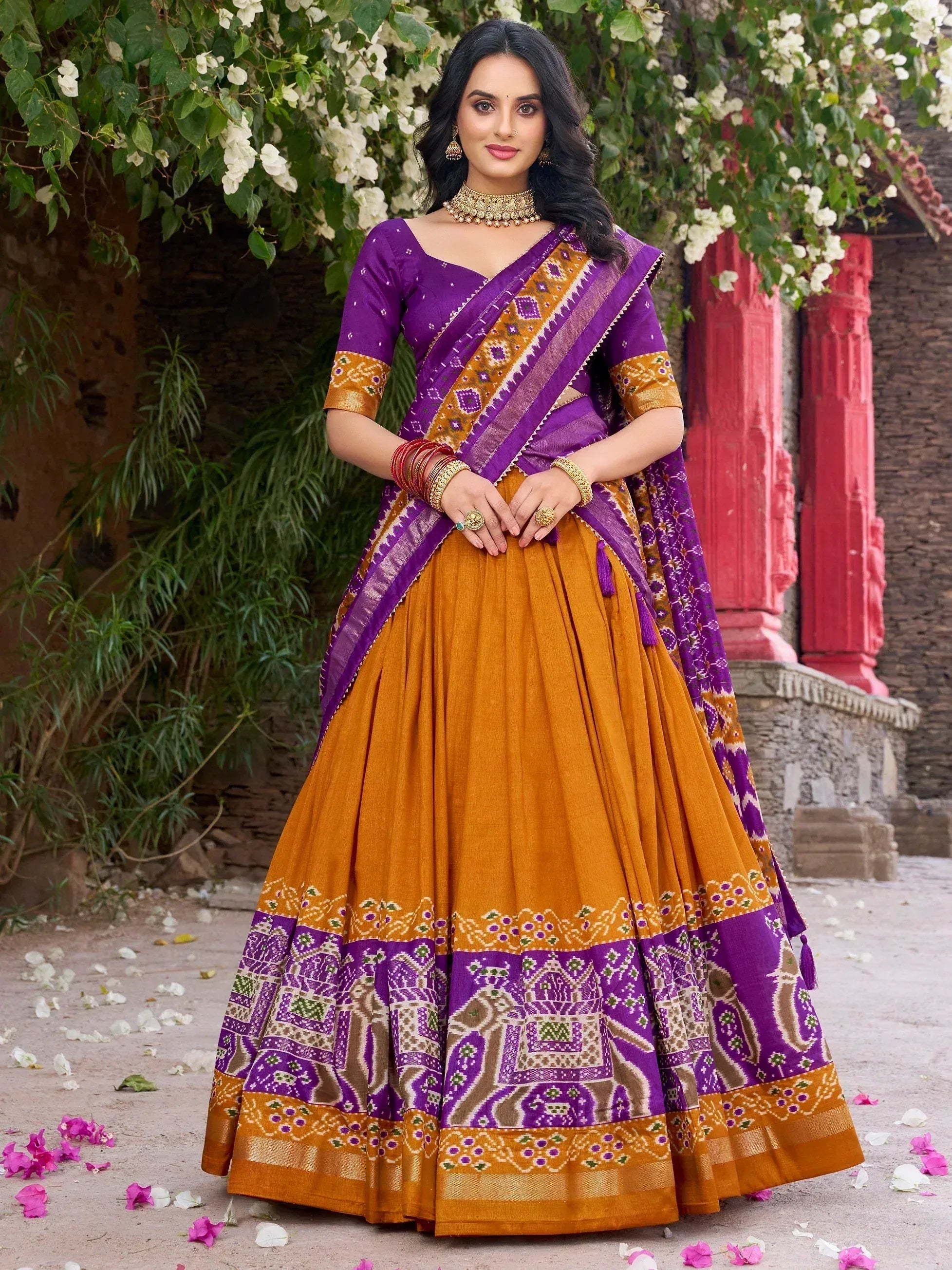 Purple and mustard Indian lehenga choli with elephant print, perfect for weddings and festivals