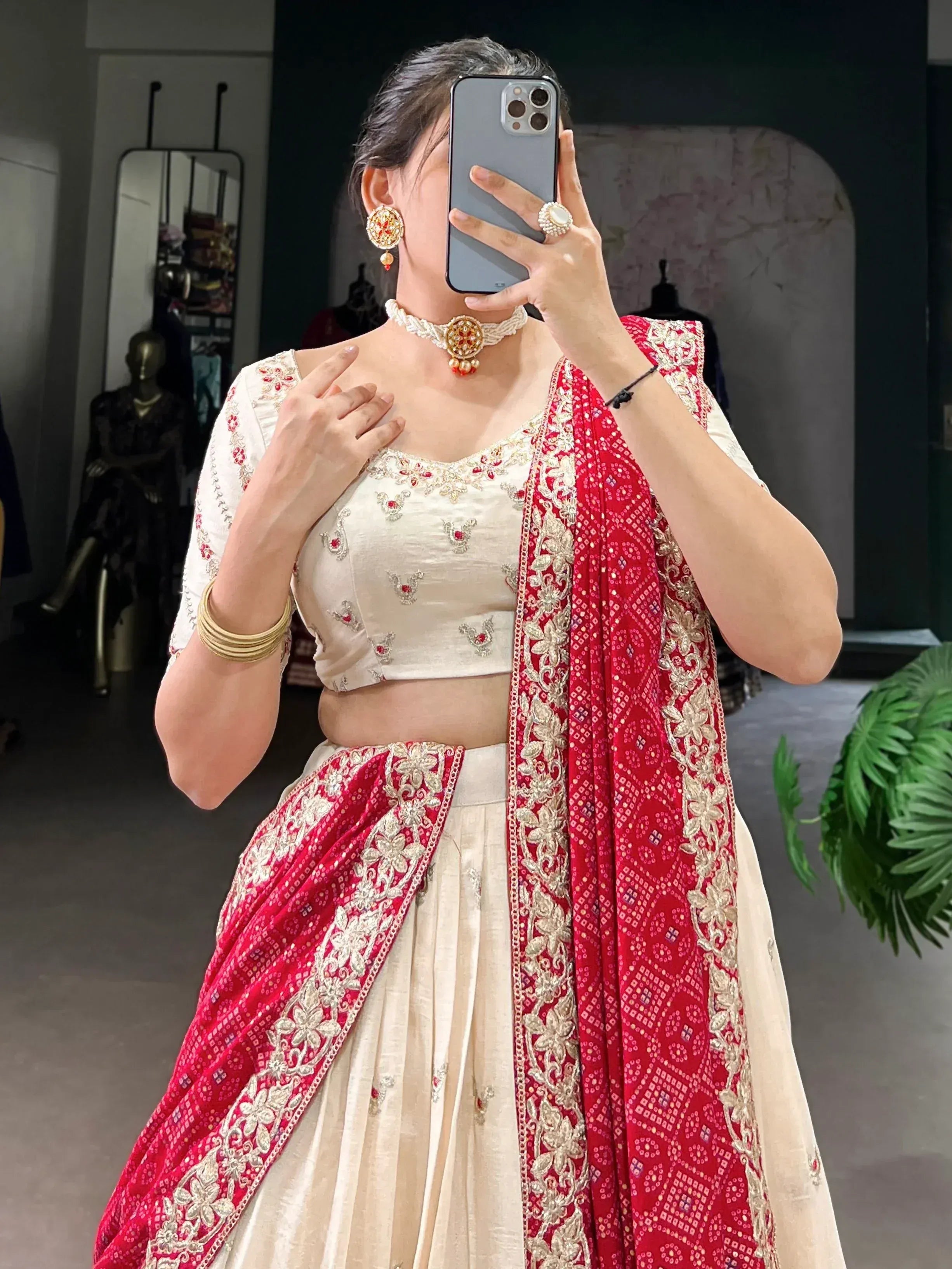 Cream embroidered lehenga choli with red dupatta, traditional Indian ethnic wear for women