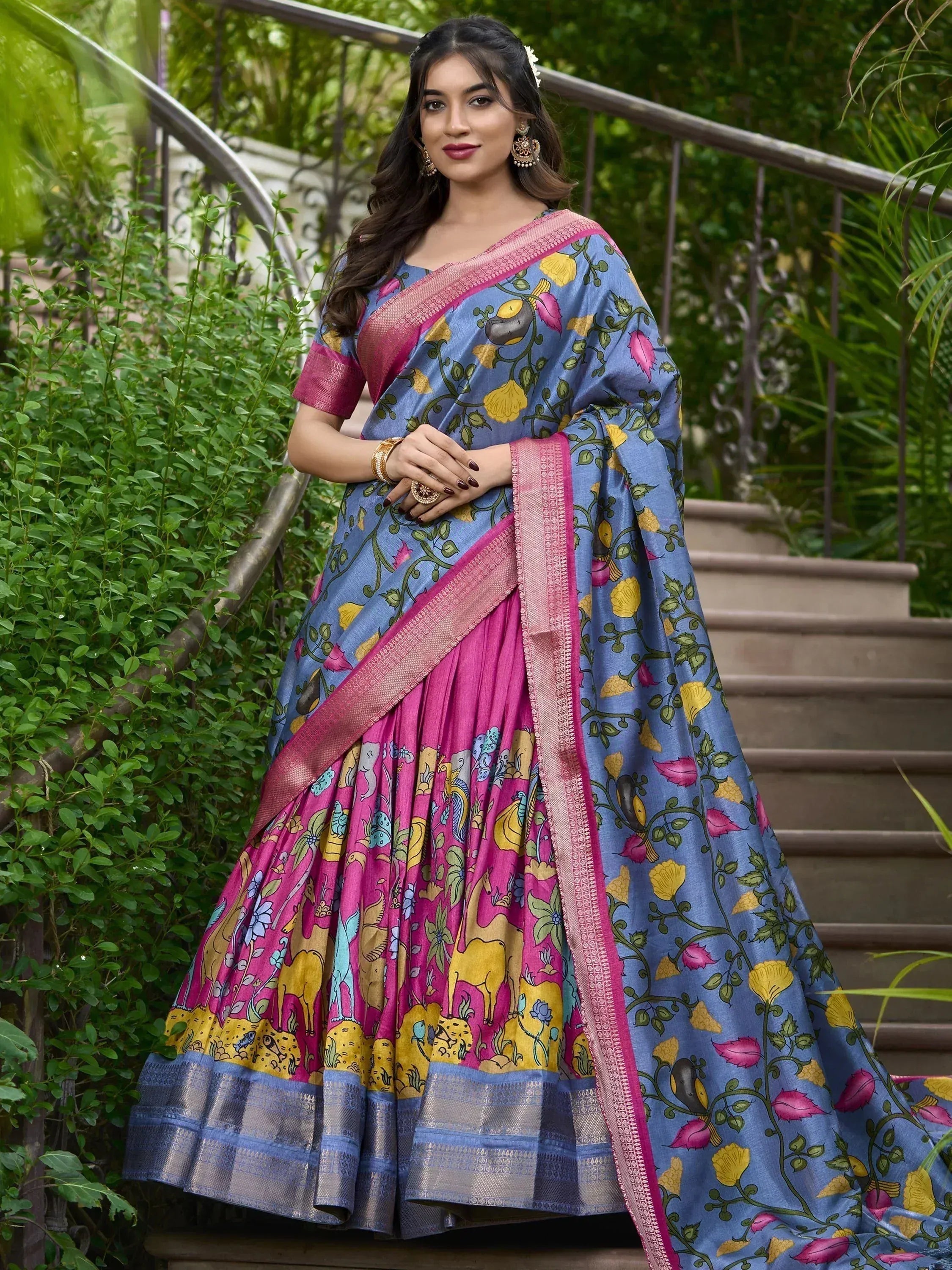 Blue and pink printed designer lehenga choli with floral and animal motifs, perfect for ethnic occasions