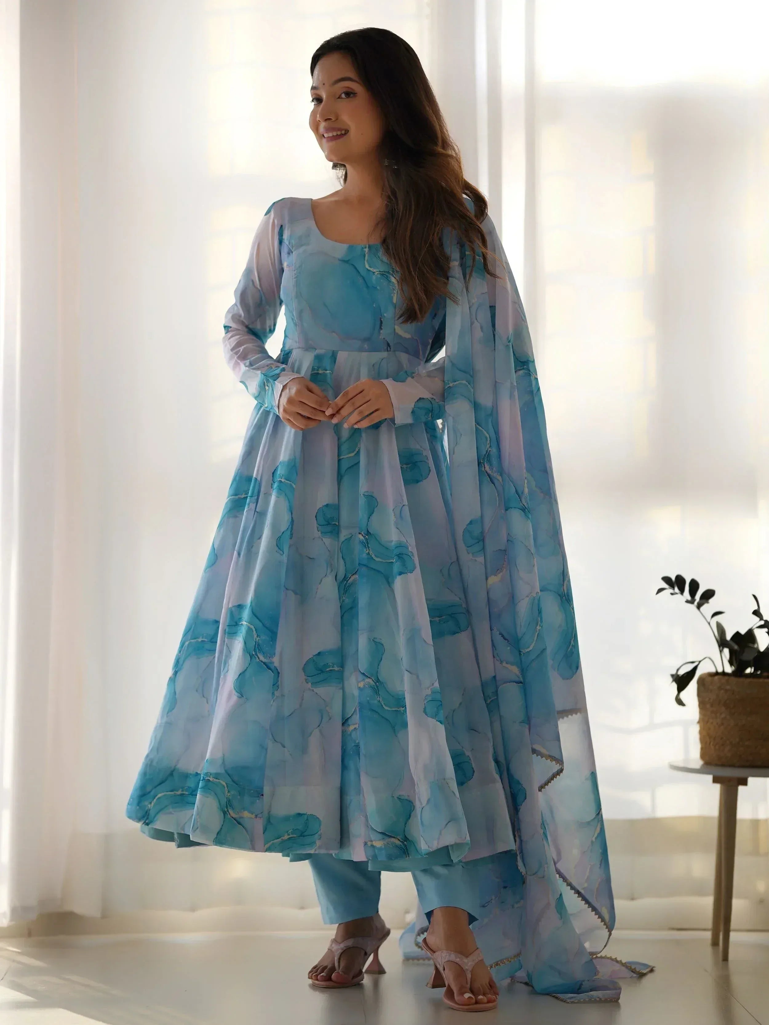 Blue floral printed anarkali suit with matching dupatta, perfect for ethnic occasions