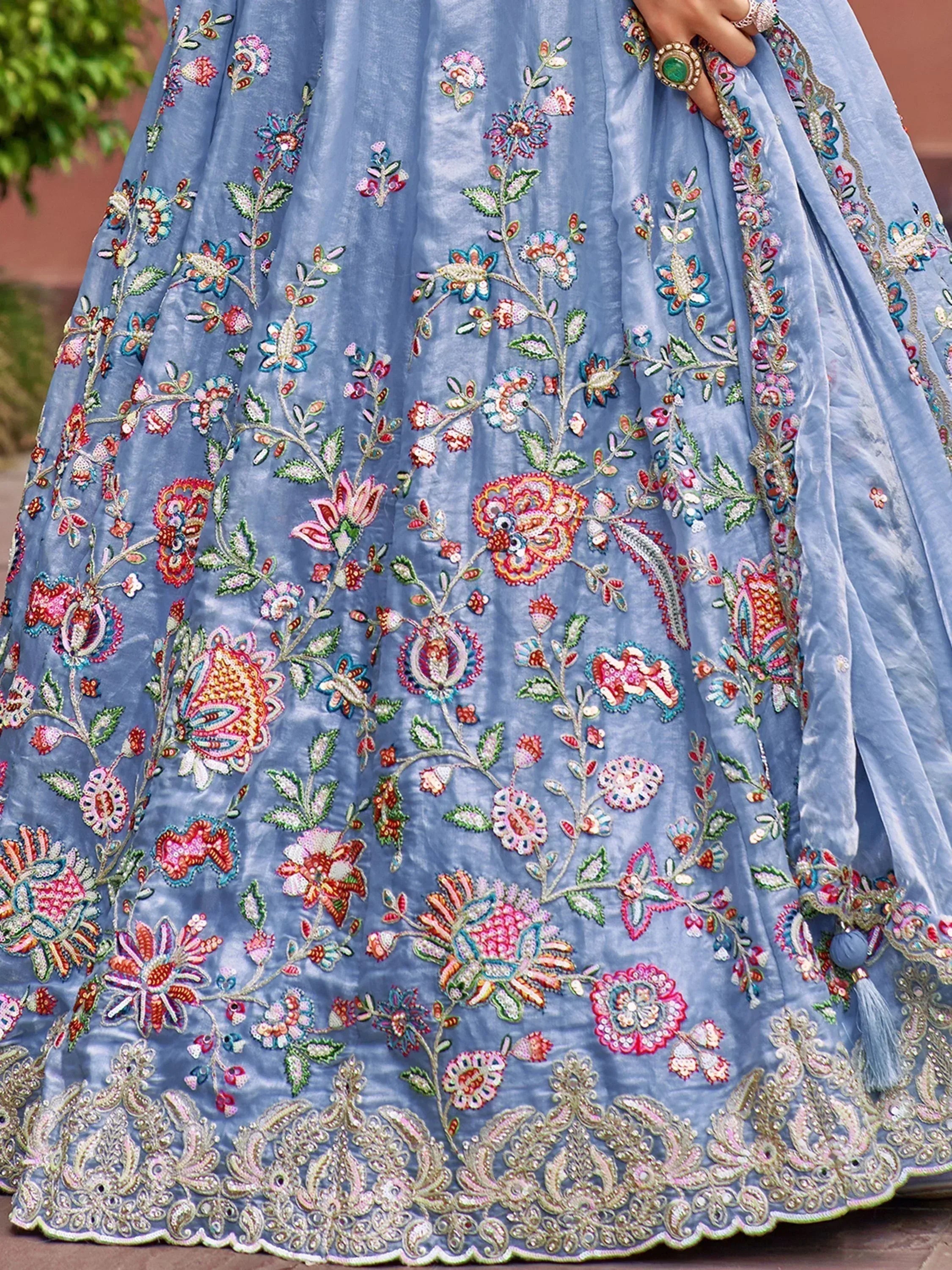 Blue velvet lehenga with intricate floral embroidery and sequin work, perfect for Indian ethnic wear