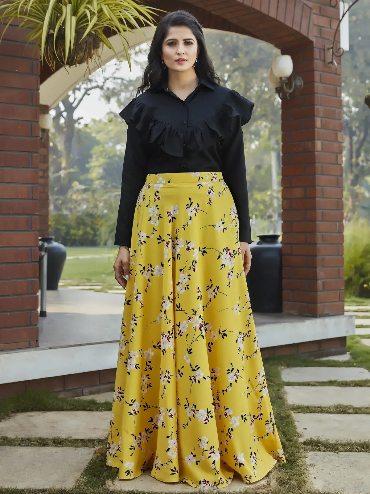 Black ruffle top with yellow floral print skirt, Indian ethnic wear for women