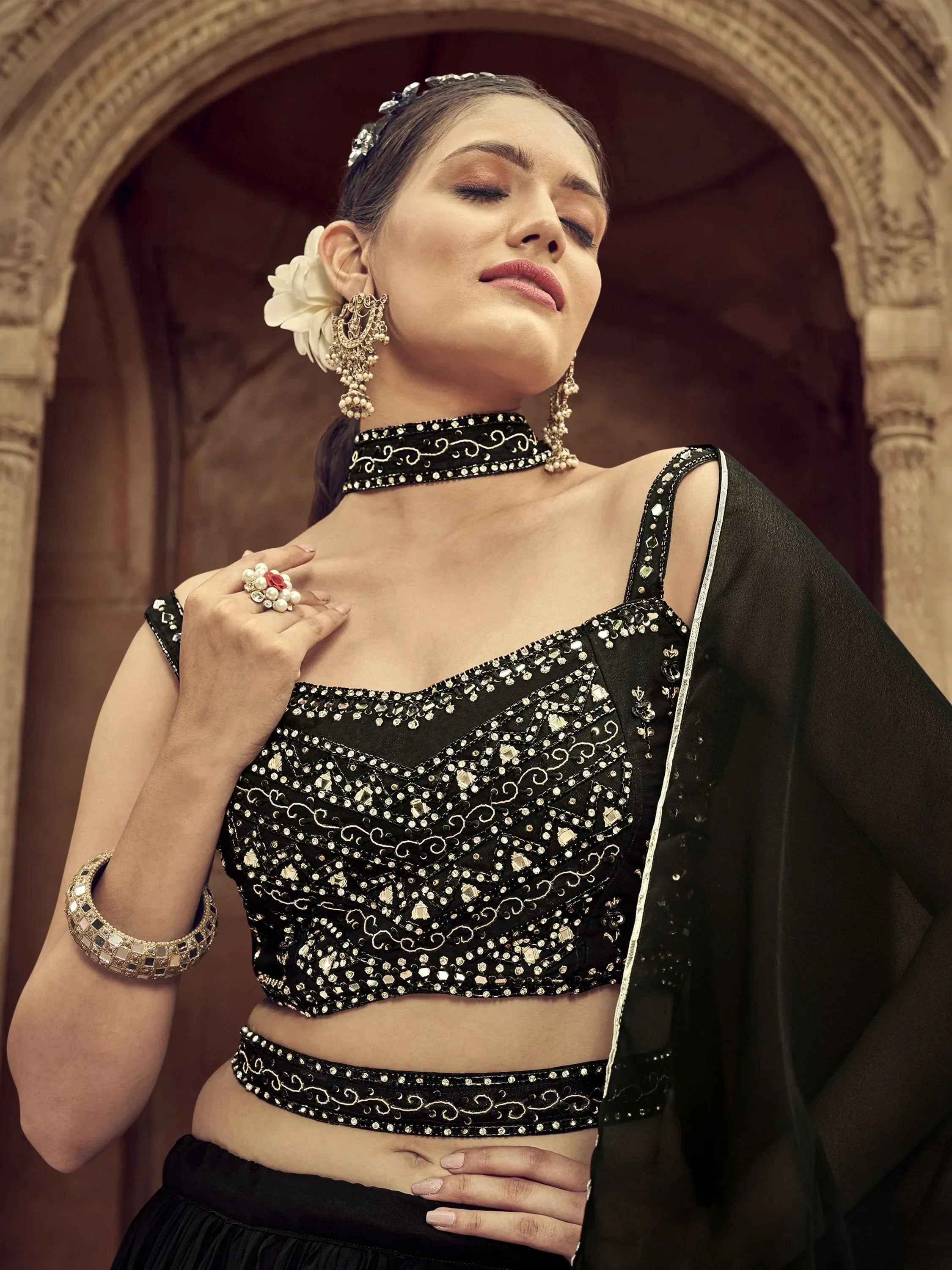 Black embroidered lehenga choli with mirror work, traditional Indian ethnic wear for women