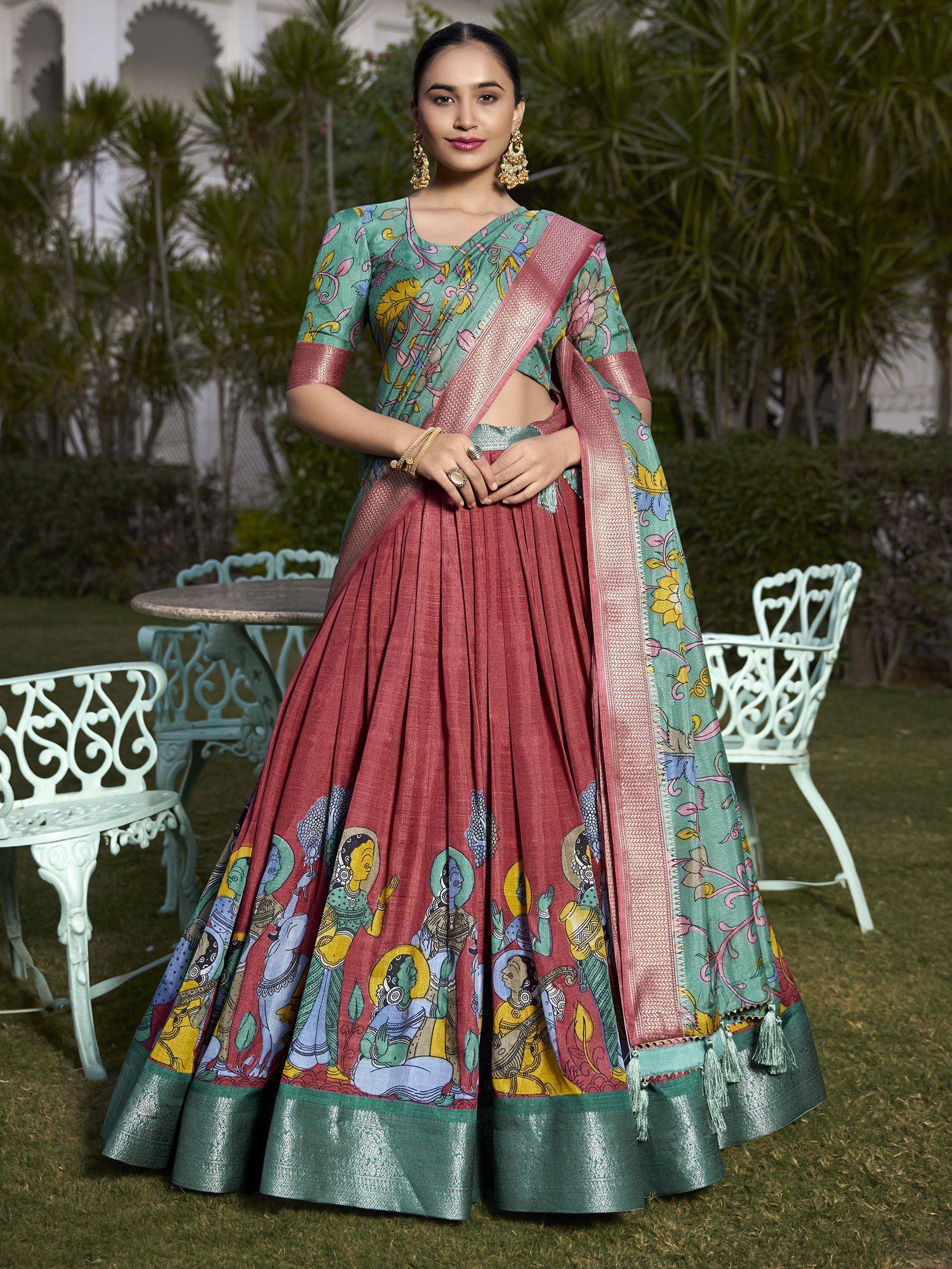 Woman in designer lehenga choli with floral and tribal print, perfect for ethnic occasions