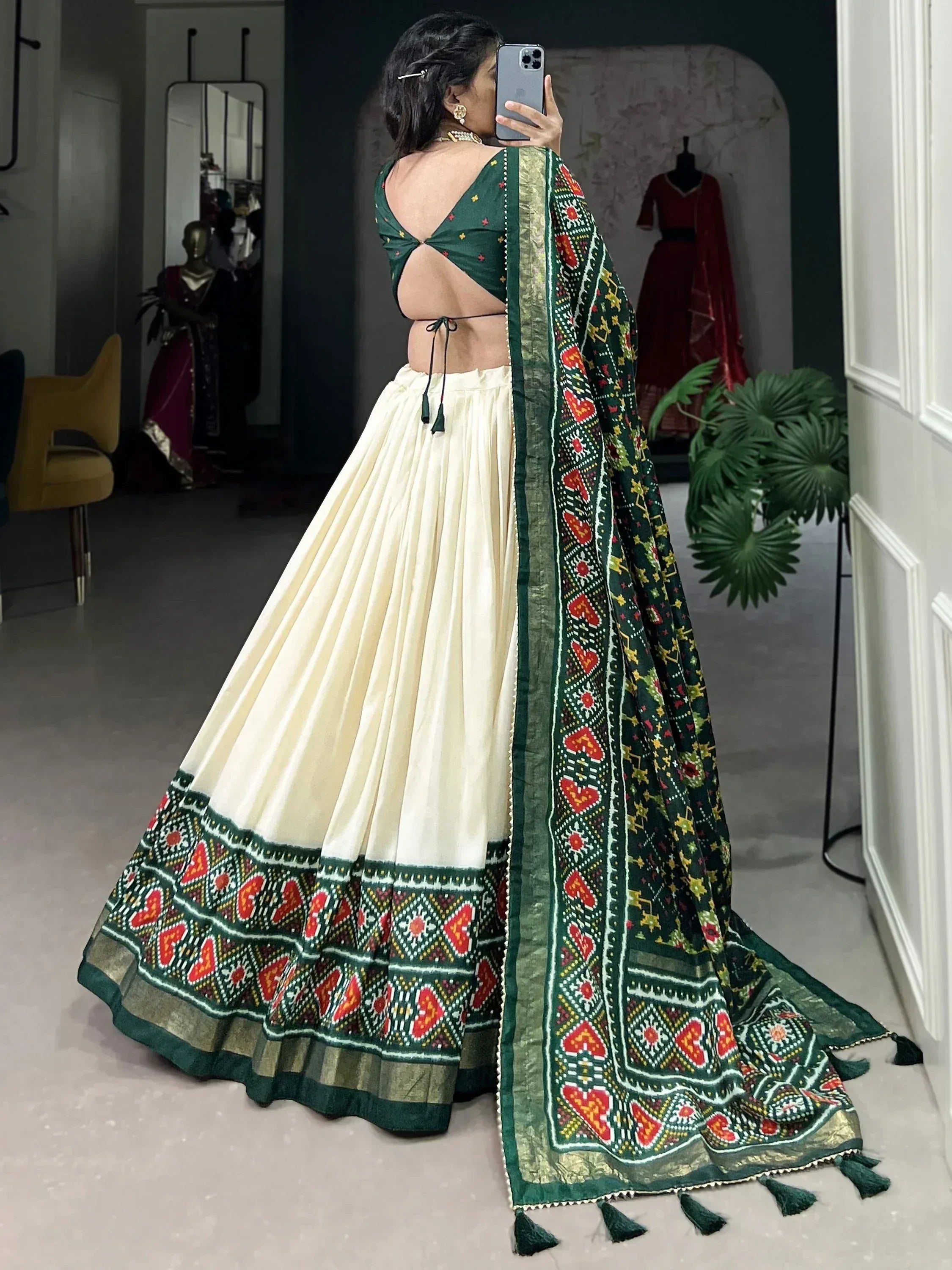 Green and cream embroidered lehenga choli with mirror work, perfect for Indian ethnic wear occasions