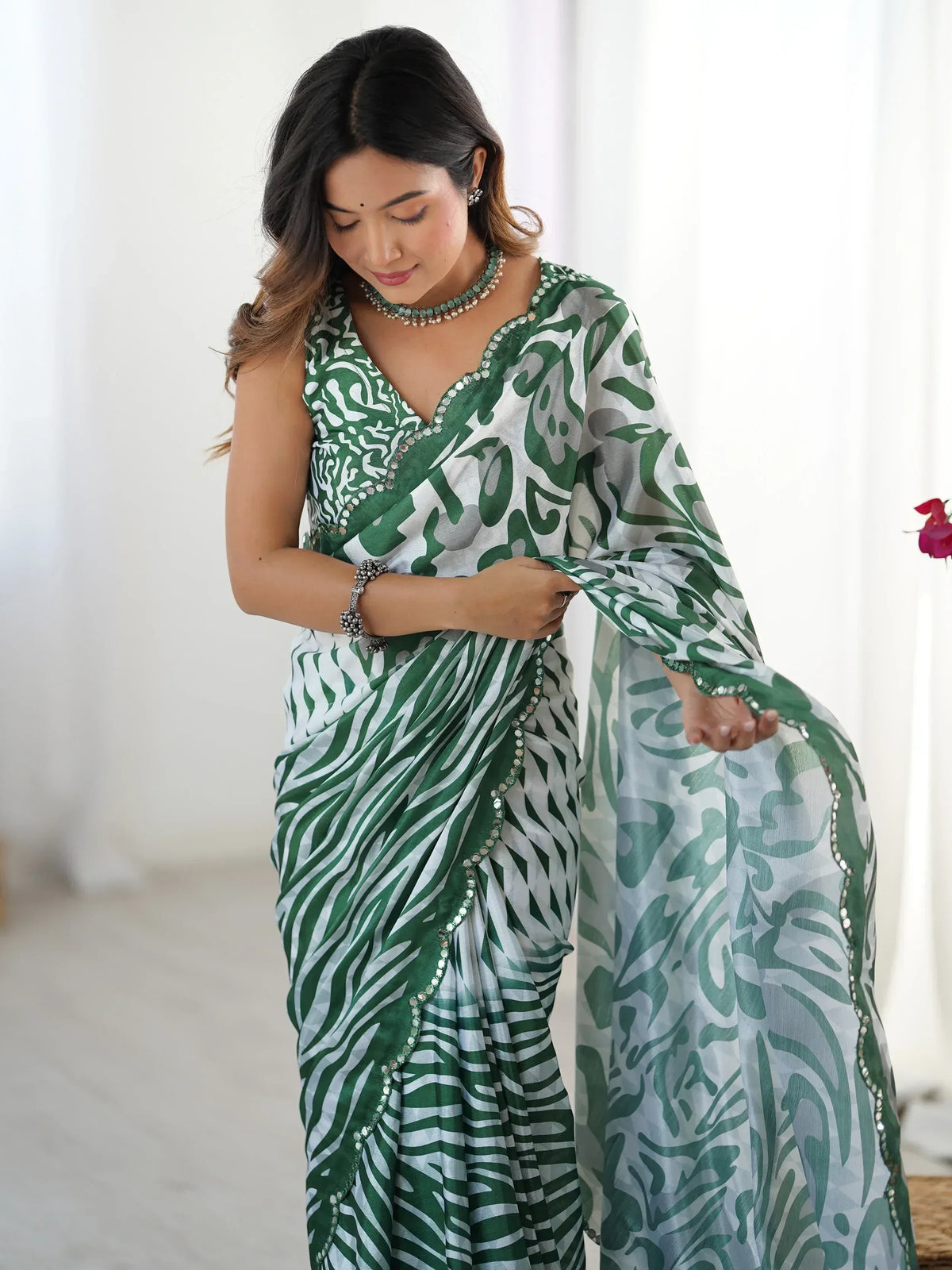 Green and white printed saree with mirror work, perfect for Indian ethnic wear