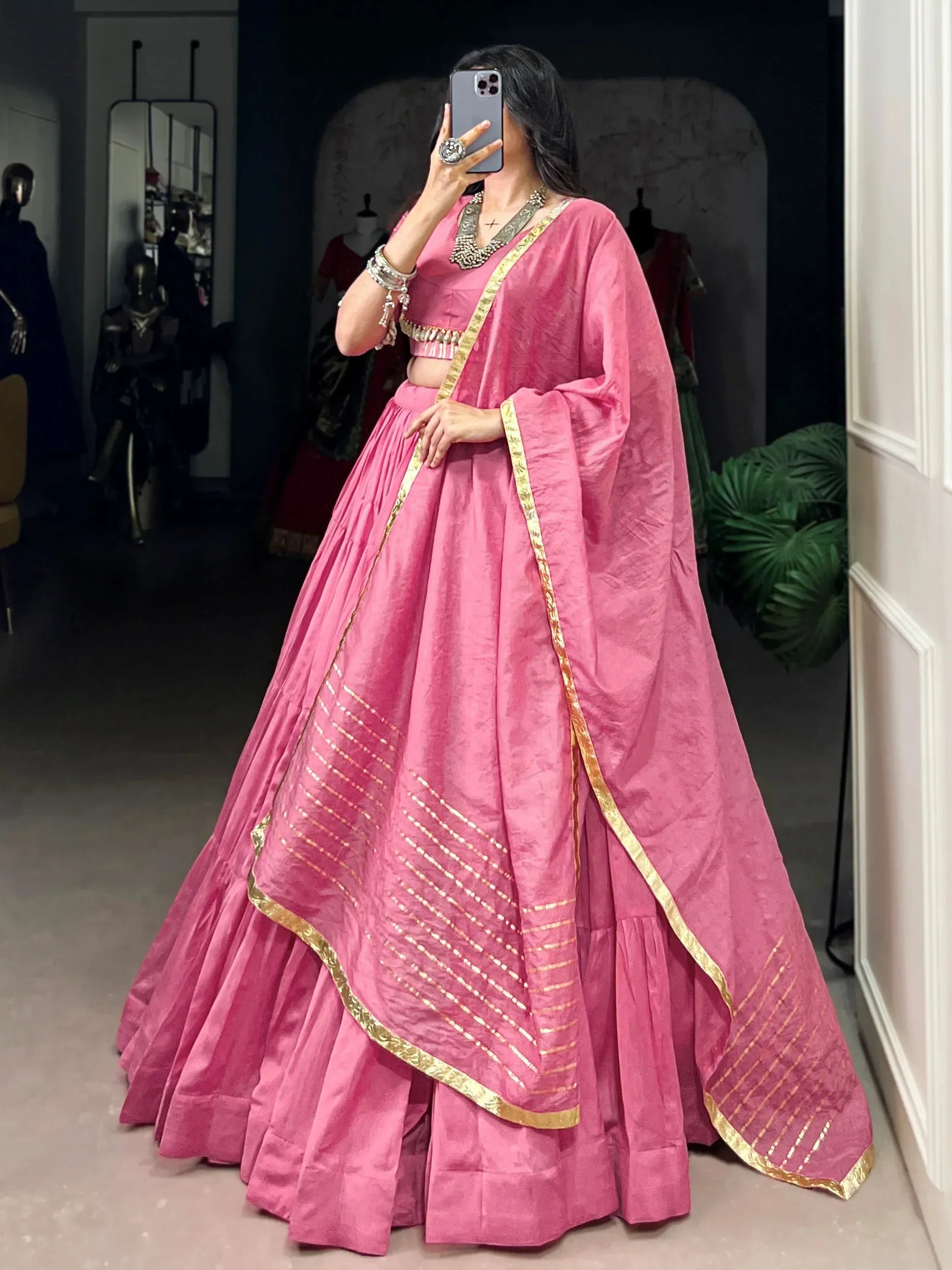Pink lehenga choli with gold trim, Indian ethnic wear for weddings and festivals
