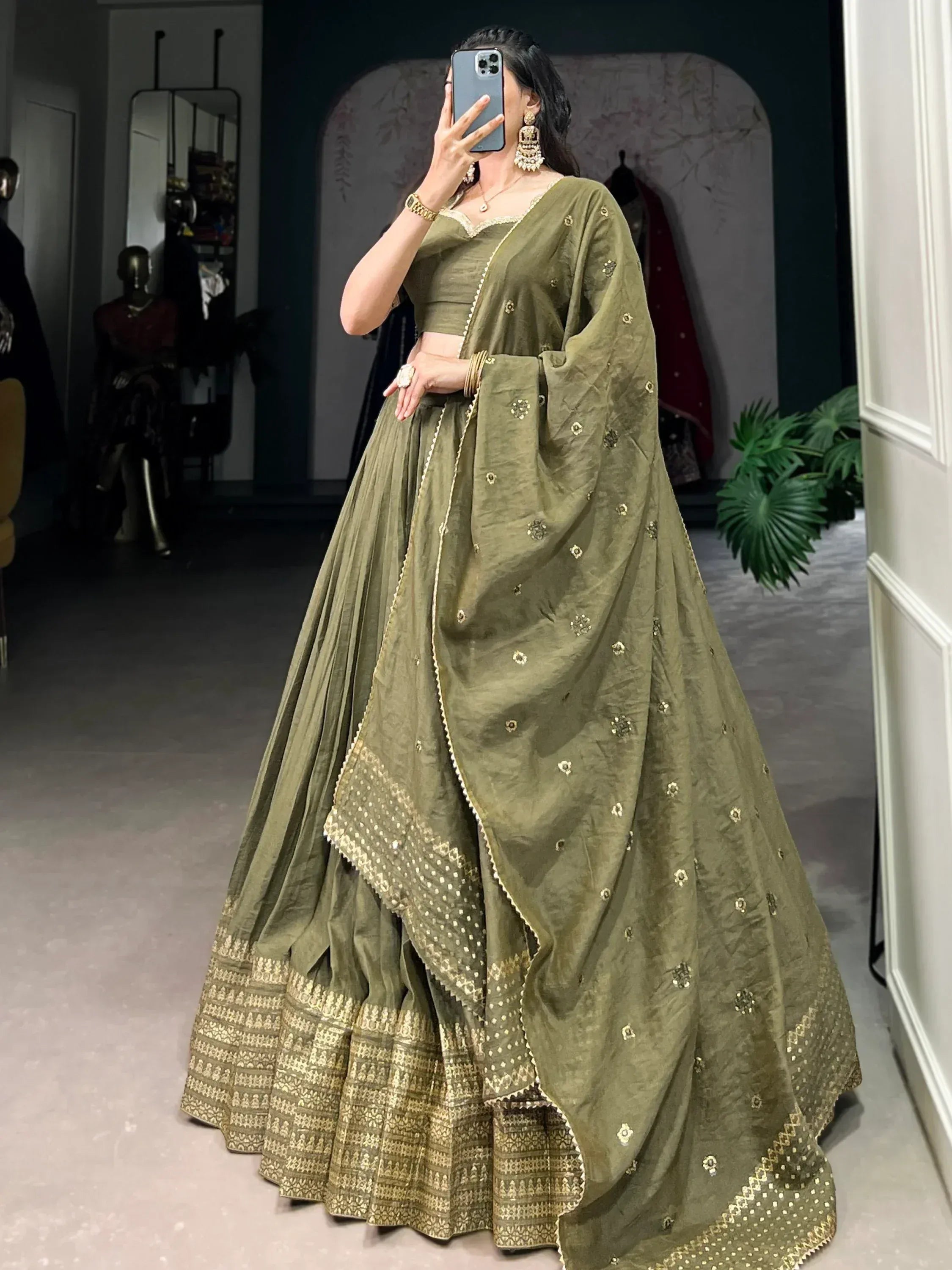 Olive green designer lehenga choli with gold embroidery, perfect for Indian ethnic wear occasions