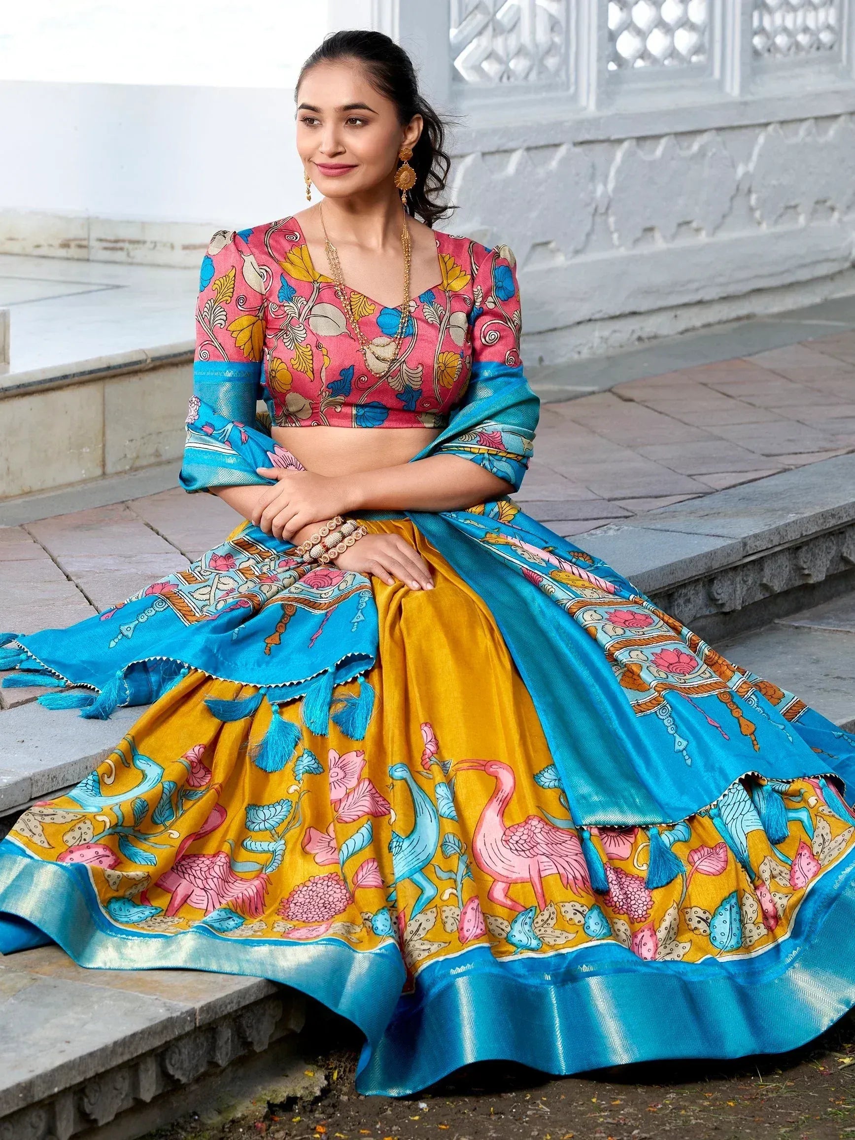 Colorful floral print lehenga choli with blue dupatta, perfect for Indian ethnic occasions