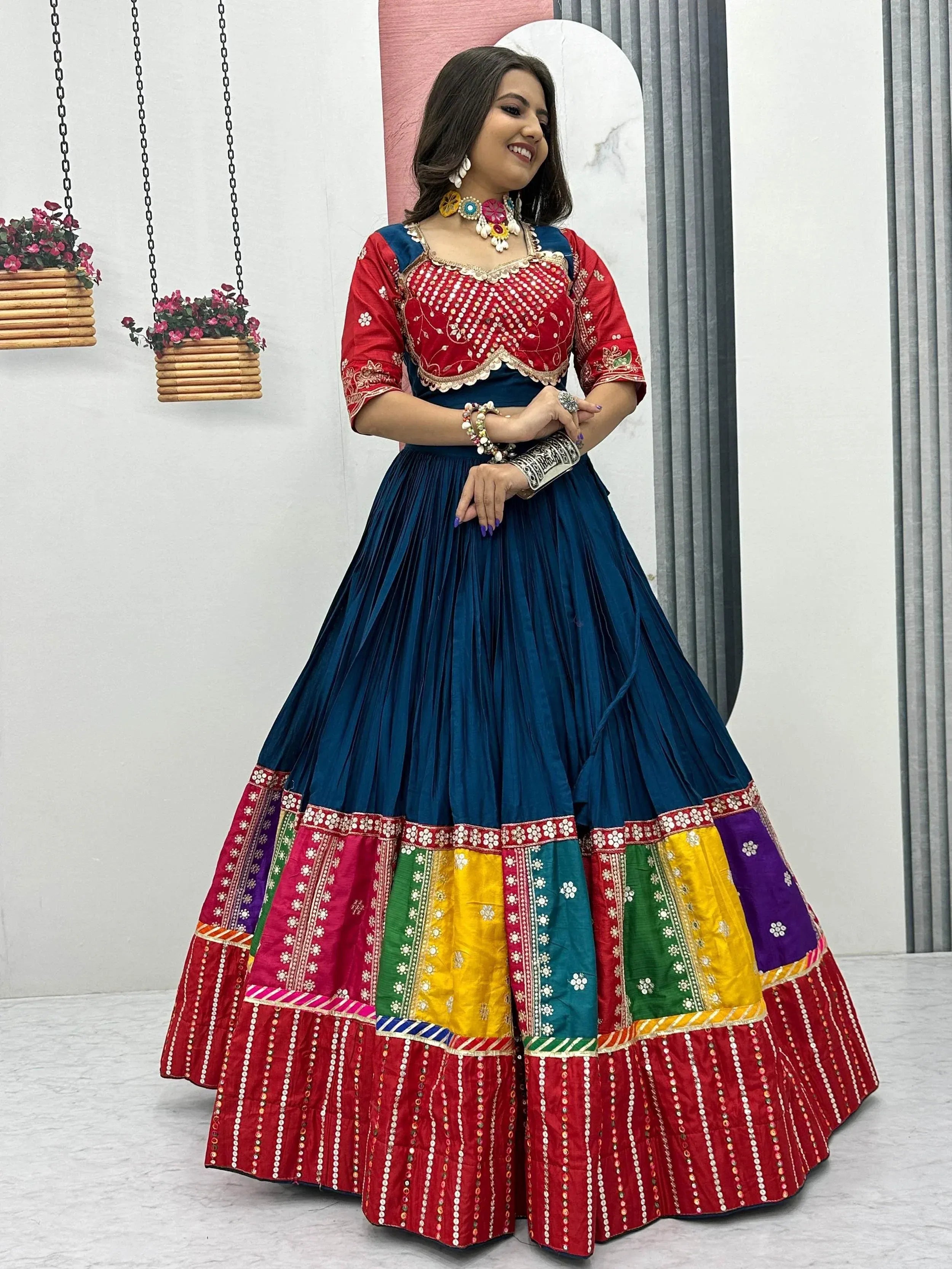 Vibrant Indian ethnic lehenga choli with colorful patchwork and mirror detailing, perfect for festive occasions.