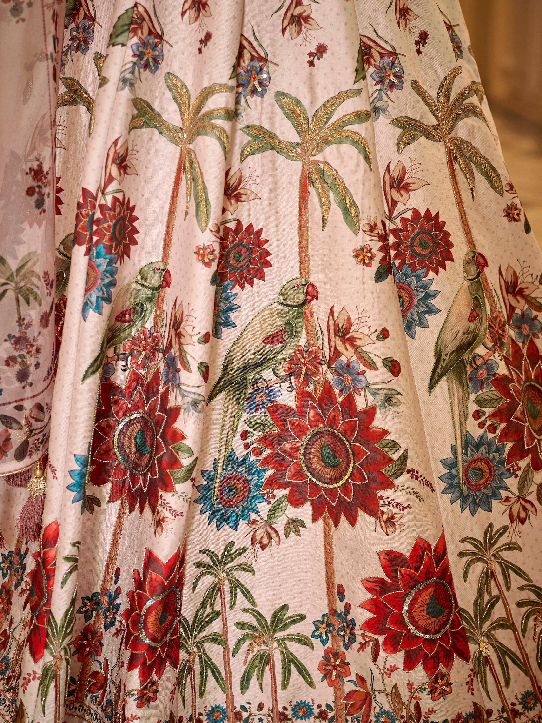 Floral and parrot embroidered lehenga skirt with palm trees, perfect for Indian ethnic wear