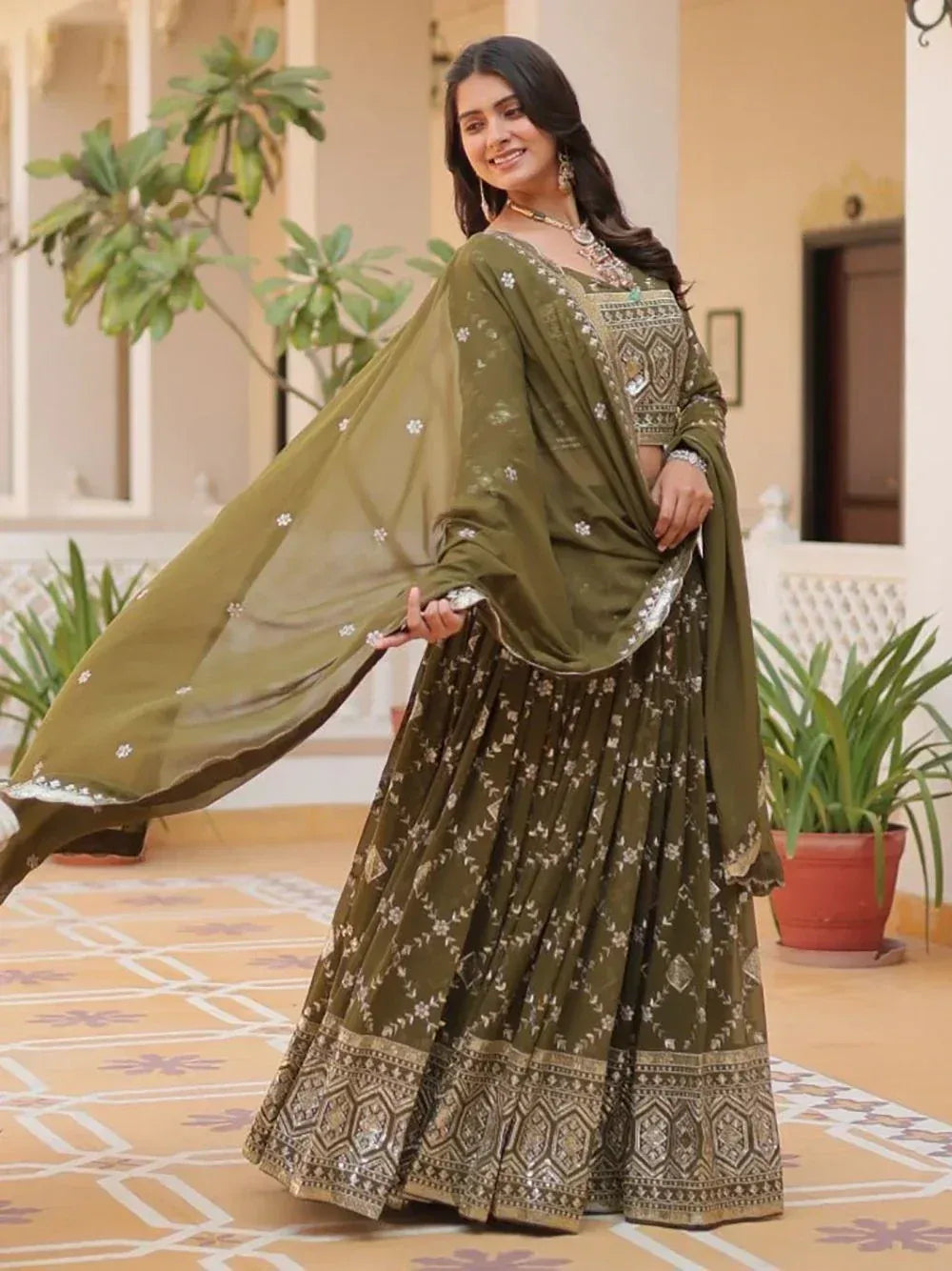 Olive green embroidered lehenga choli with floral dupatta, perfect for Indian ethnic occasions