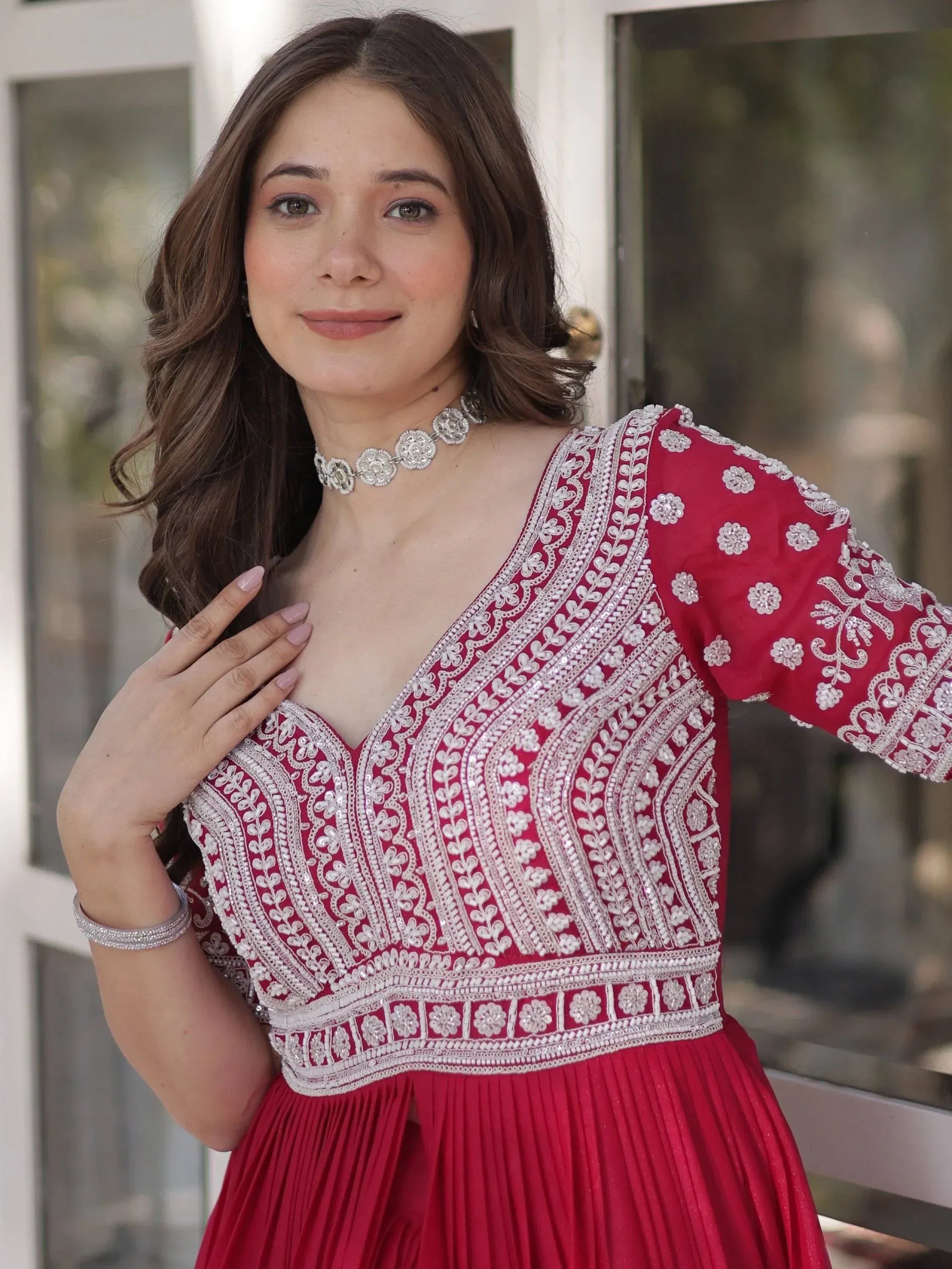Red ethnic gown with white embroidery, perfect for Indian occasions and festive wear
