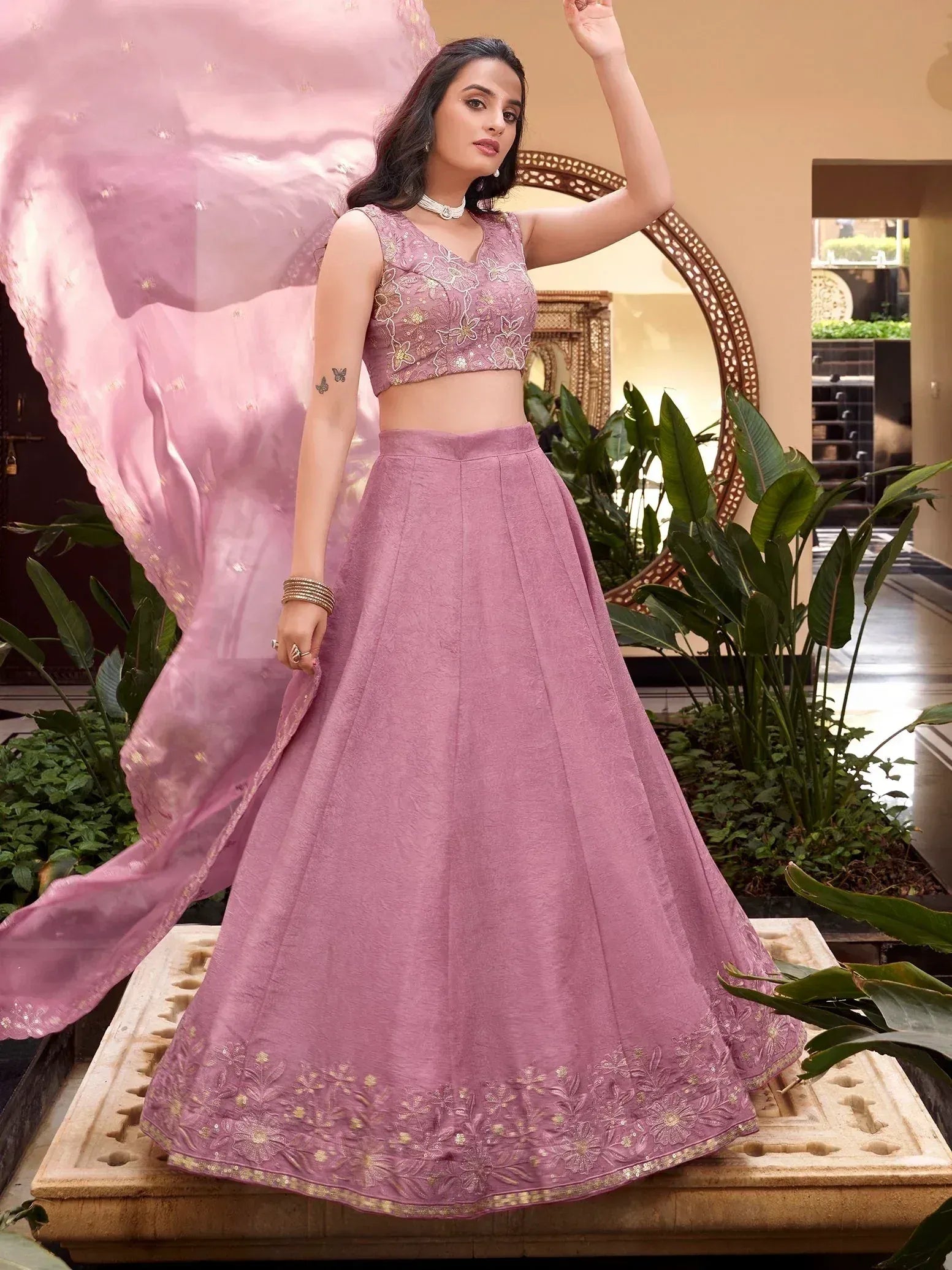 Pink embroidered lehenga choli with floral detailing, perfect for Indian ethnic wear occasions