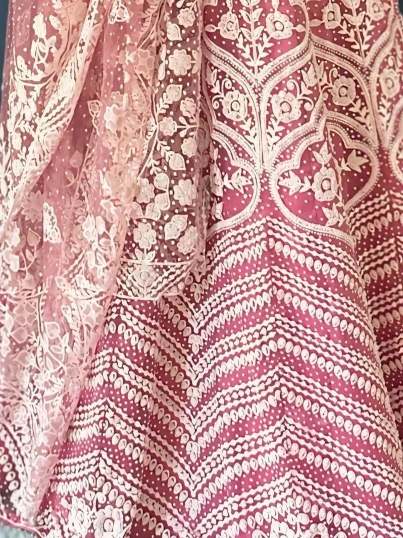 Pink floral and geometric printed ethnic lehenga skirt with sheer overlay