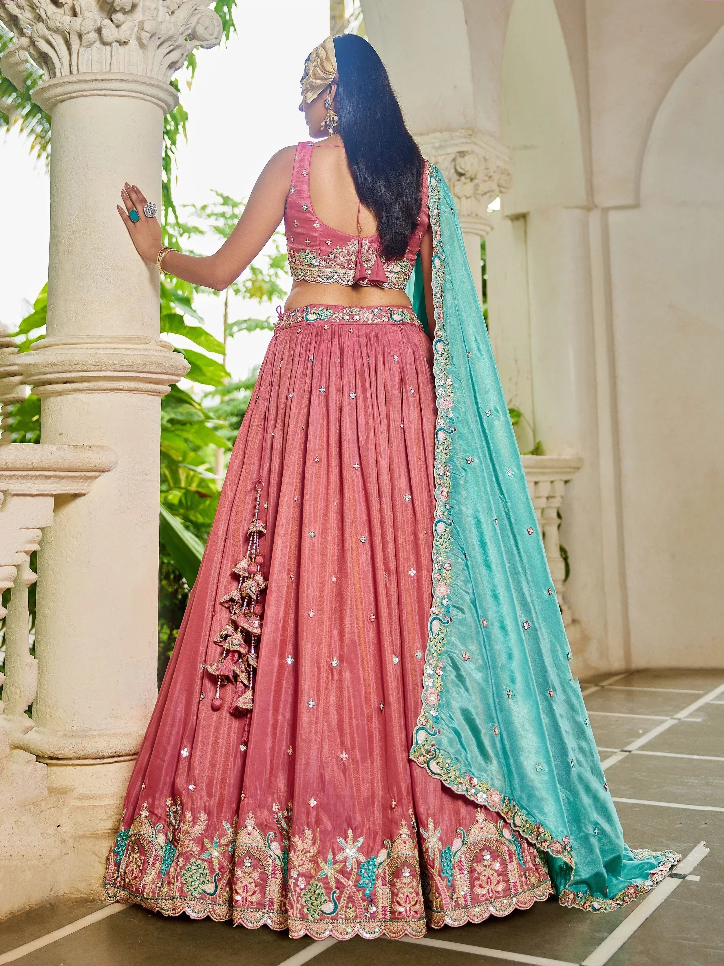 Pink embroidered lehenga choli with turquoise dupatta, traditional Indian ethnic wear for weddings and festivals