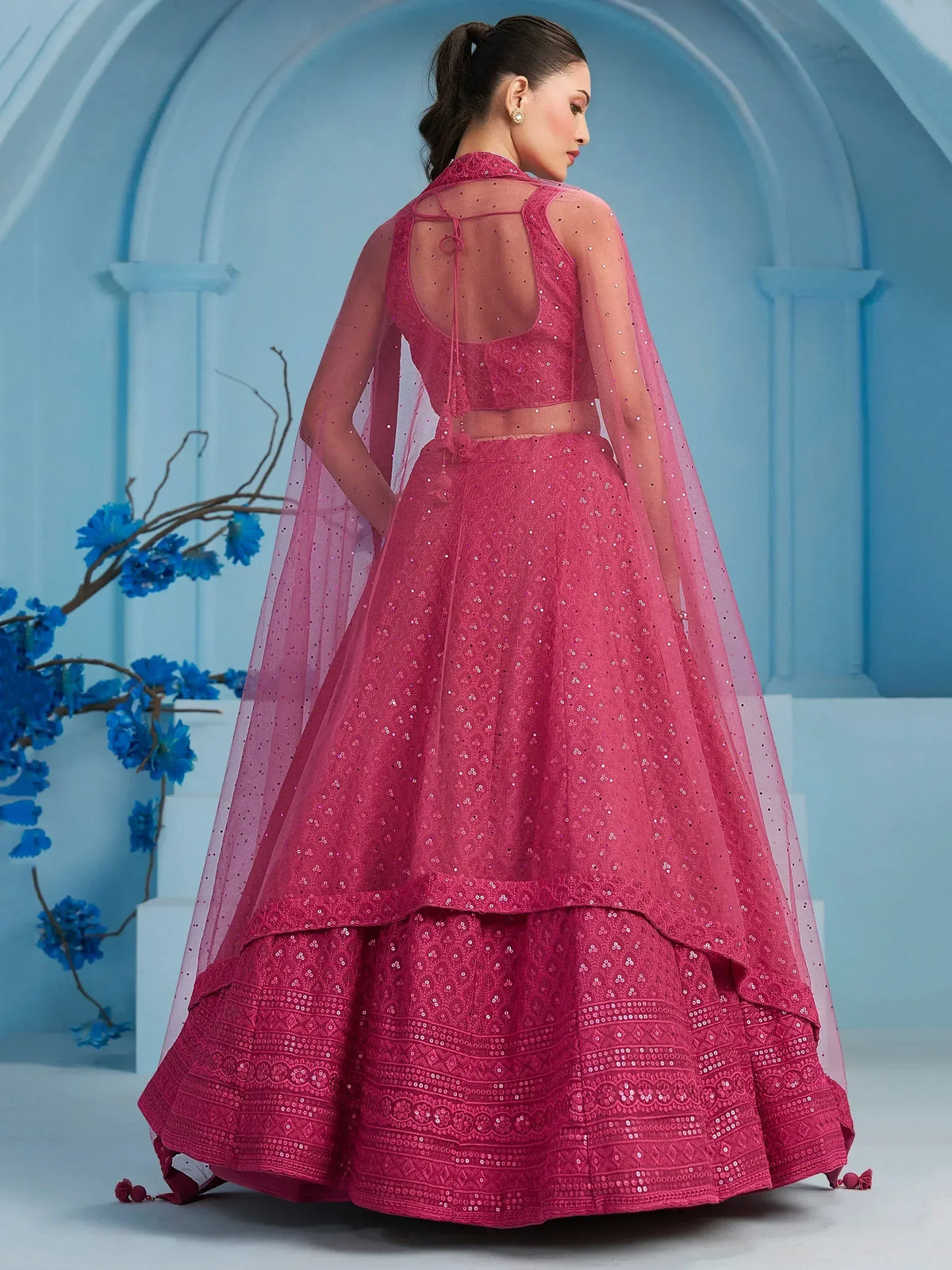 Pink sequined lehenga choli with sheer cape, back view, ethnic Indian wear