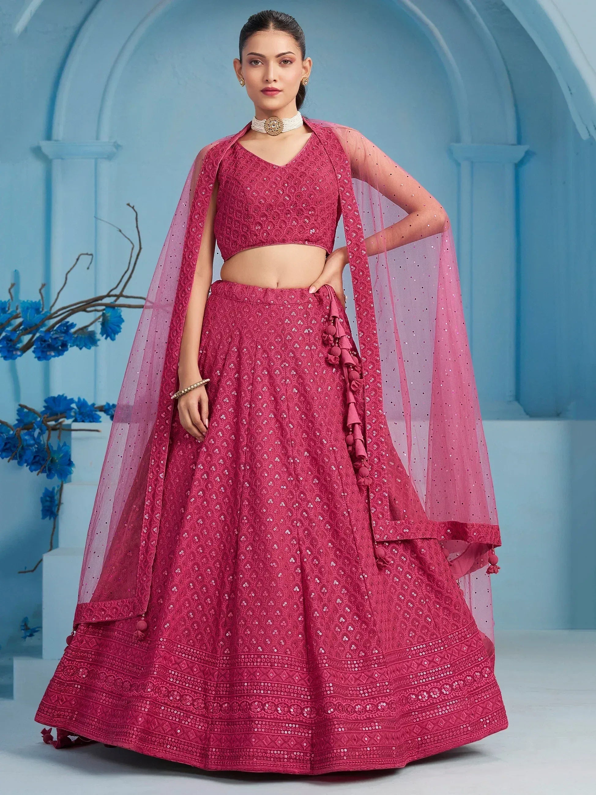 Pink designer lehenga choli with sequin work and sheer dupatta, perfect for Indian ethnic wear occasions