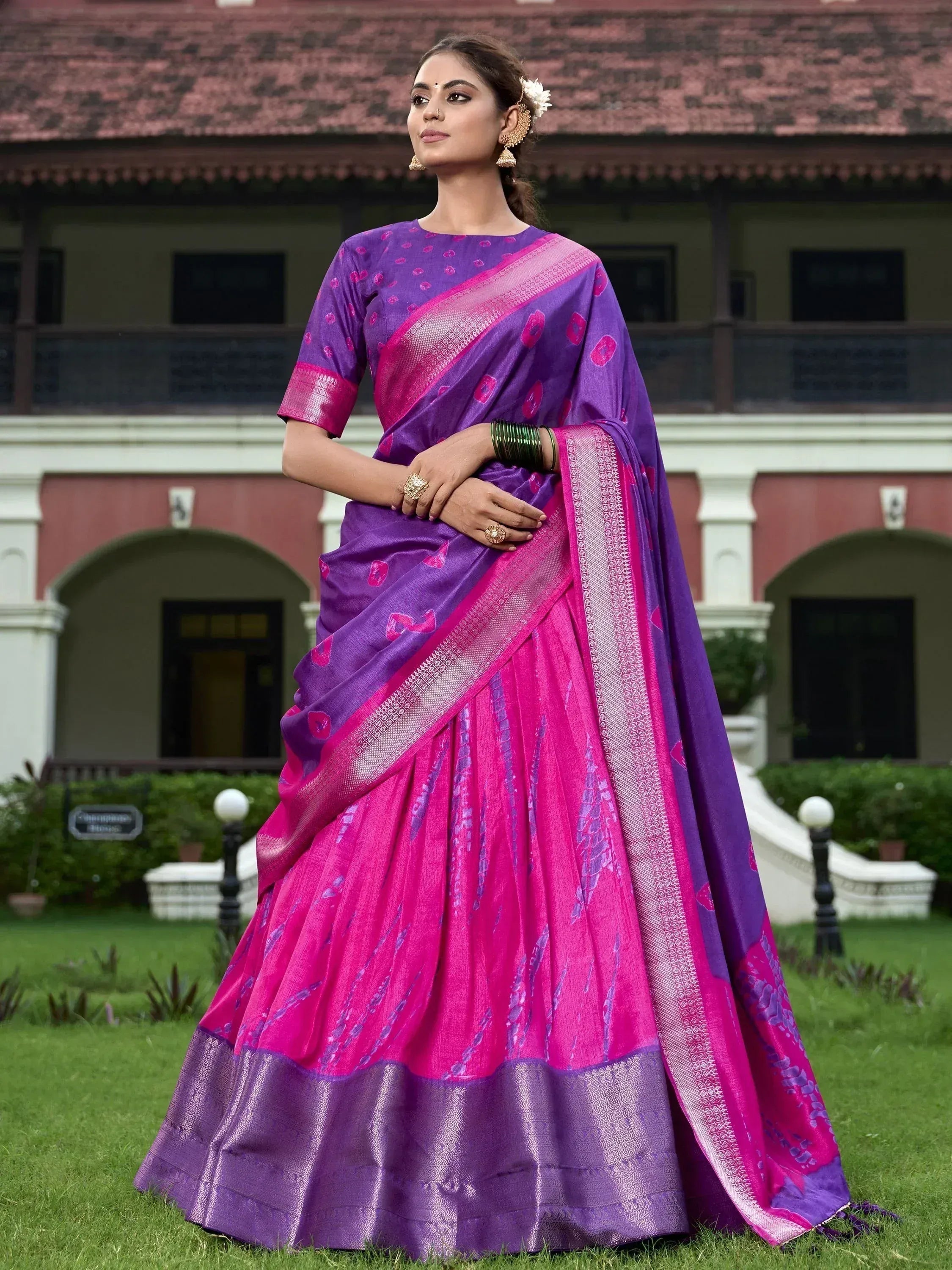 Purple and pink designer saree with floral print, perfect for ethnic occasions