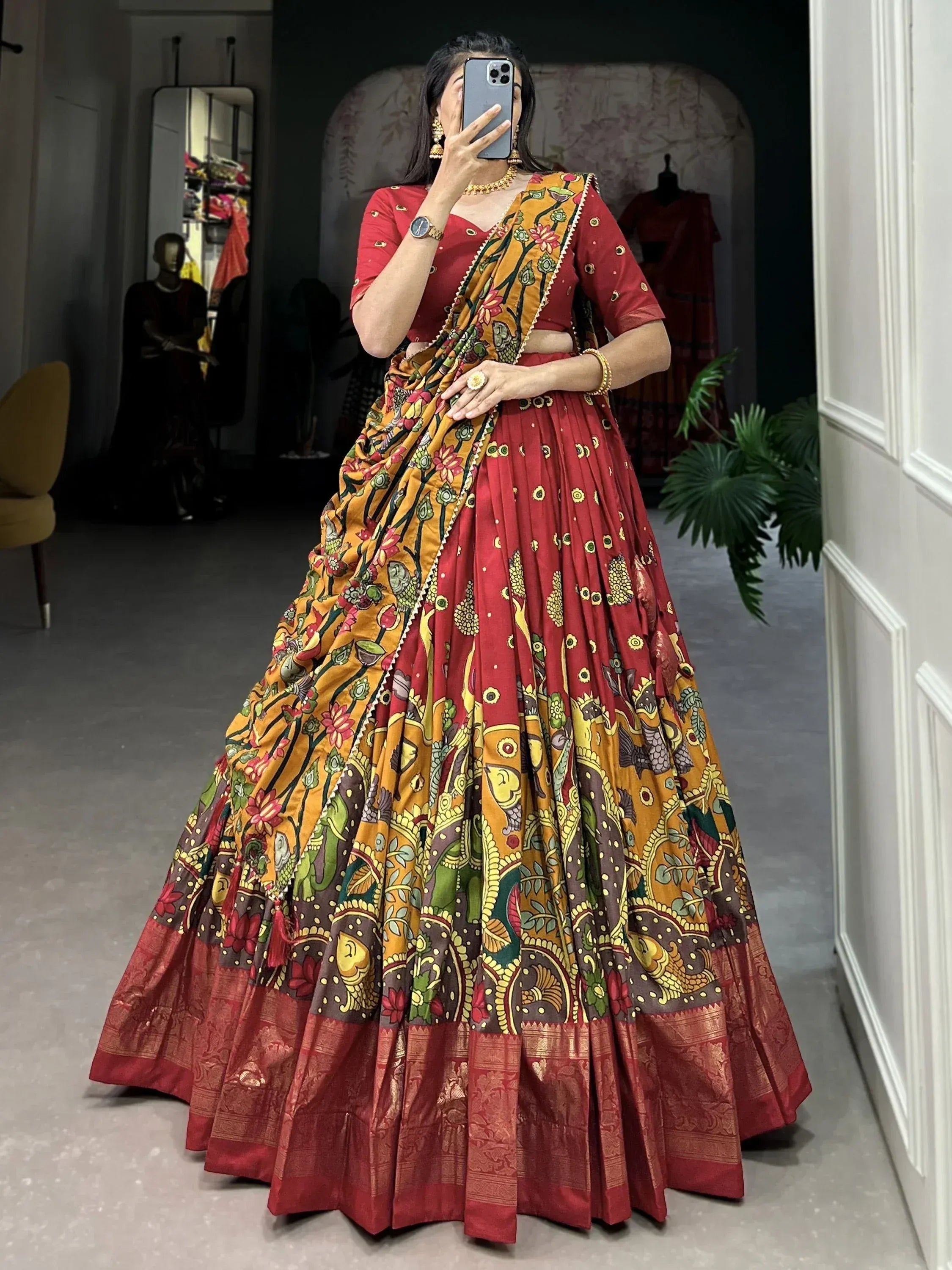 Red and yellow printed lehenga choli with floral dupatta, Indian ethnic wear for women