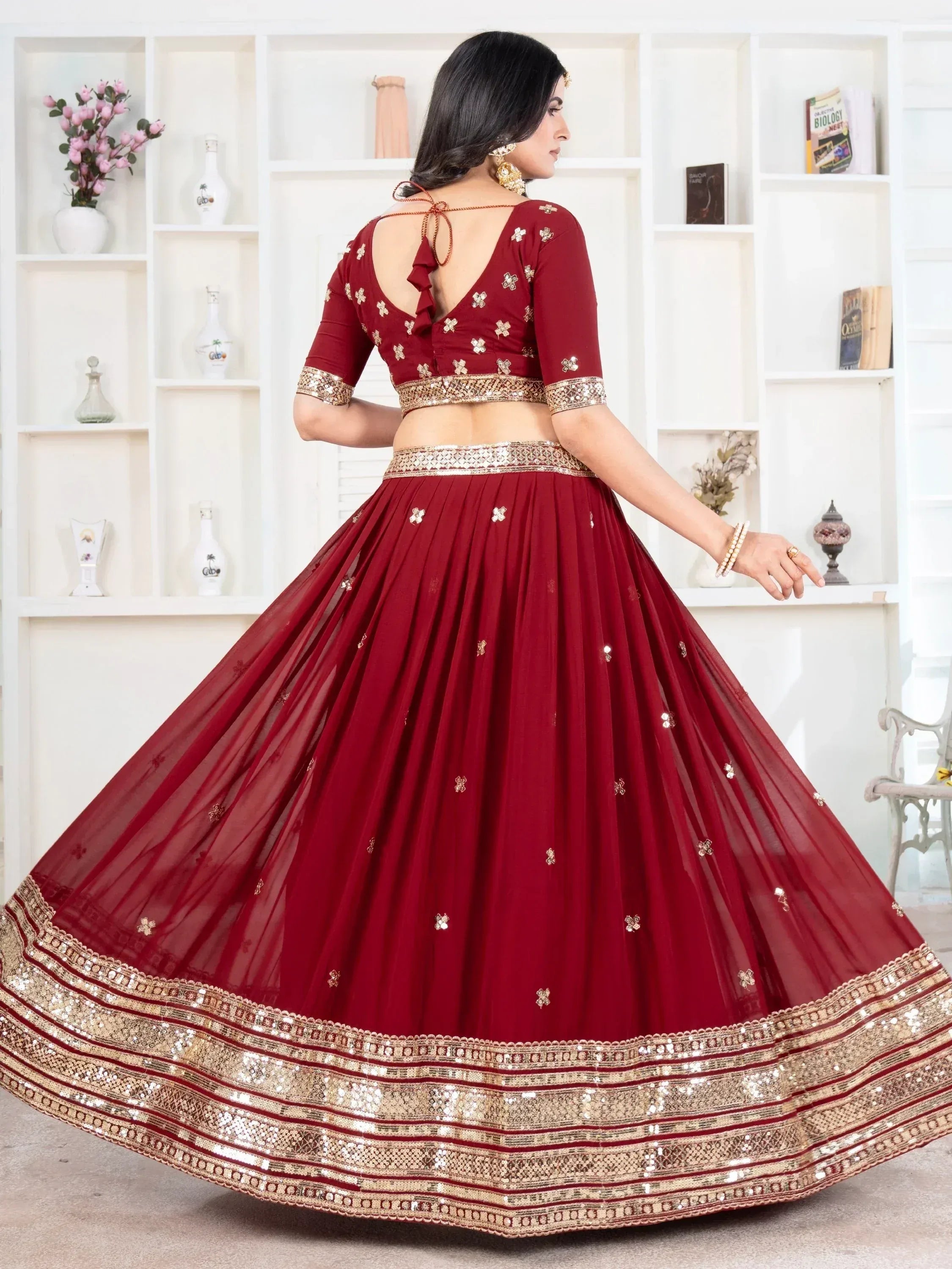 Maroon designer lehenga choli with gold embroidery and sequin border, ethnic wear for women