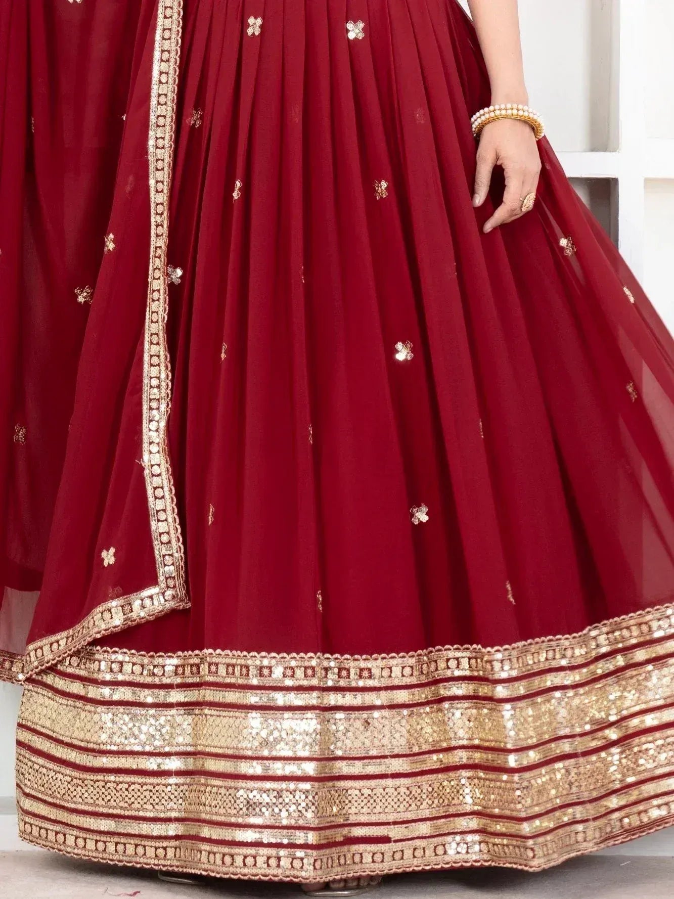 Maroon lehenga choli with gold embroidery and sequin border, Indian ethnic wear