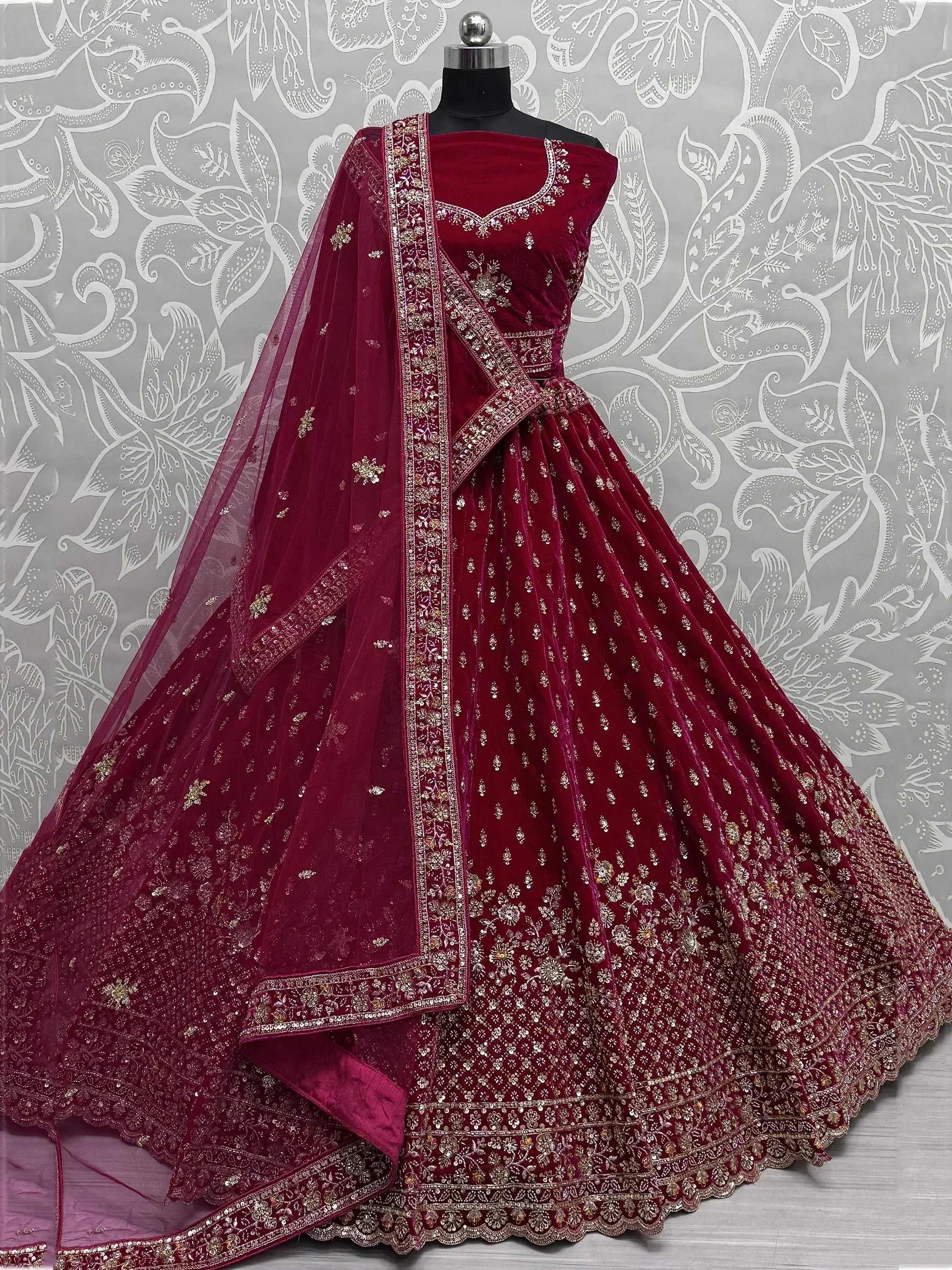 Burgundy velvet lehenga choli with gold embroidery and net dupatta, Indian ethnic wear