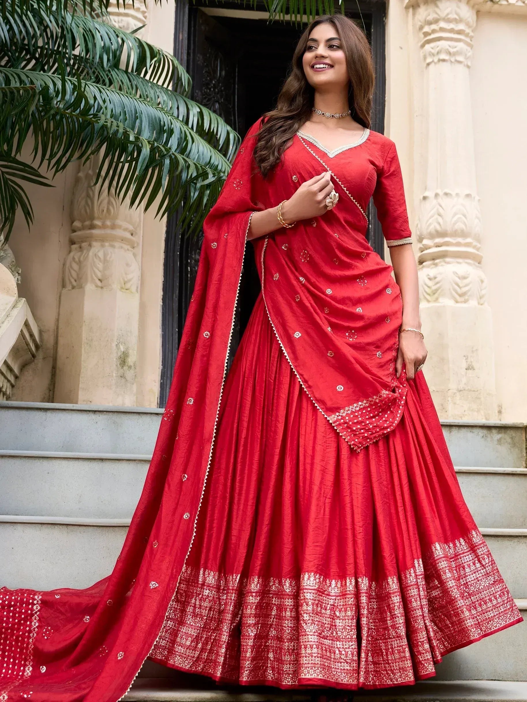 Red designer lehenga choli with embroidered dupatta, perfect for Indian ethnic wear occasions