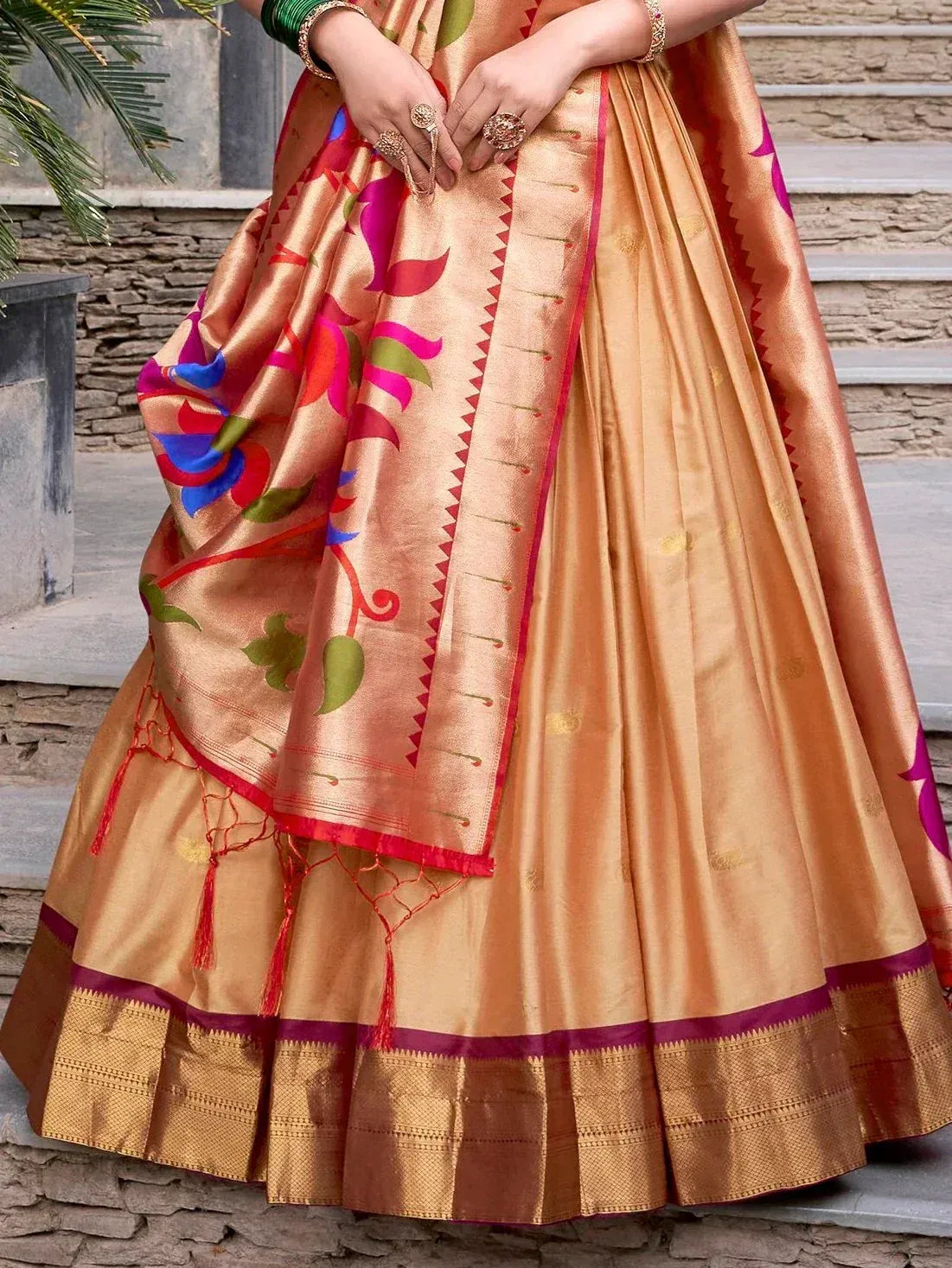 Golden lehenga choli with floral print dupatta, ethnic Indian wear for weddings and festivals