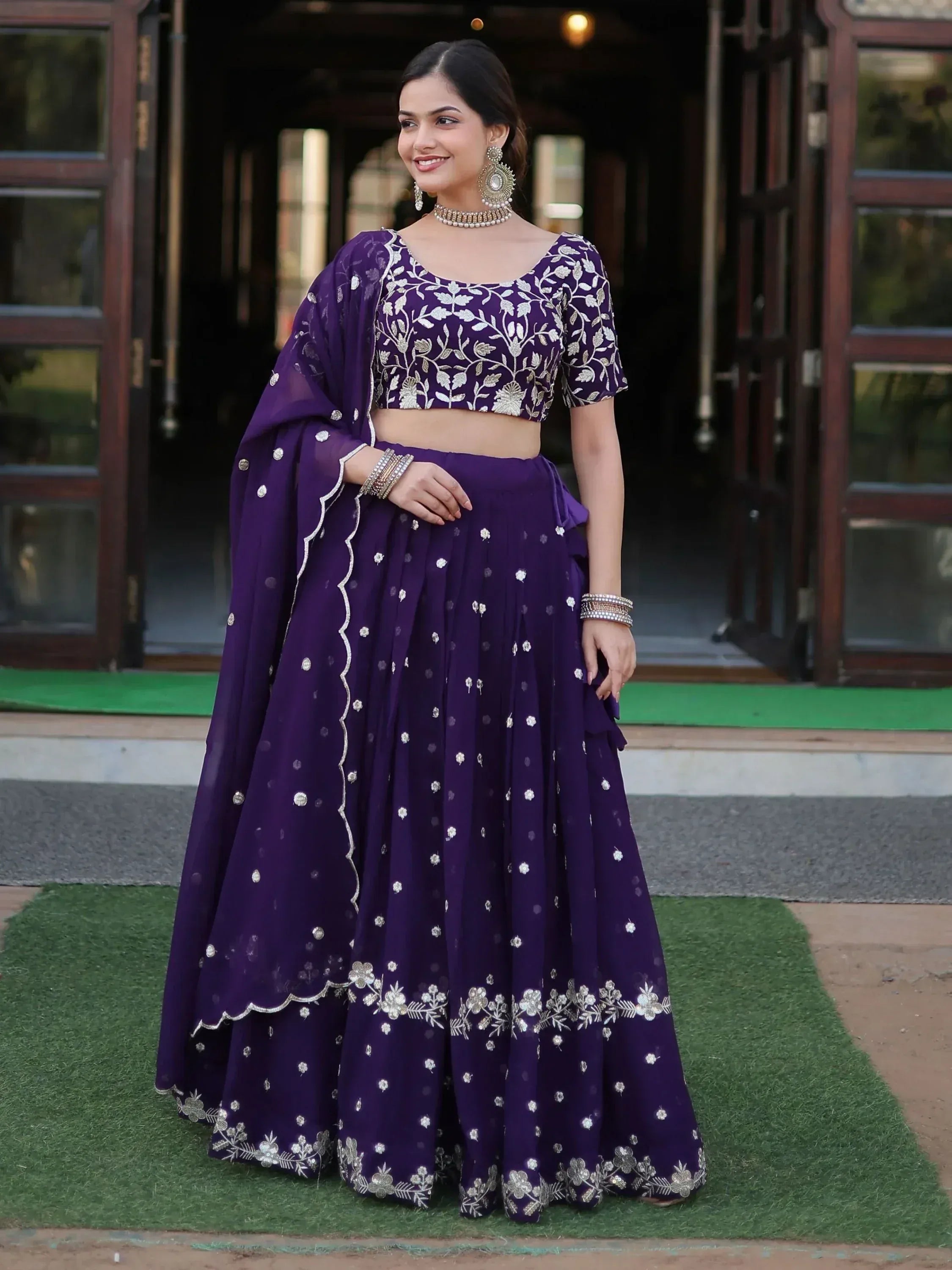 Purple embroidered lehenga choli with floral zari work, perfect for Indian ethnic occasions