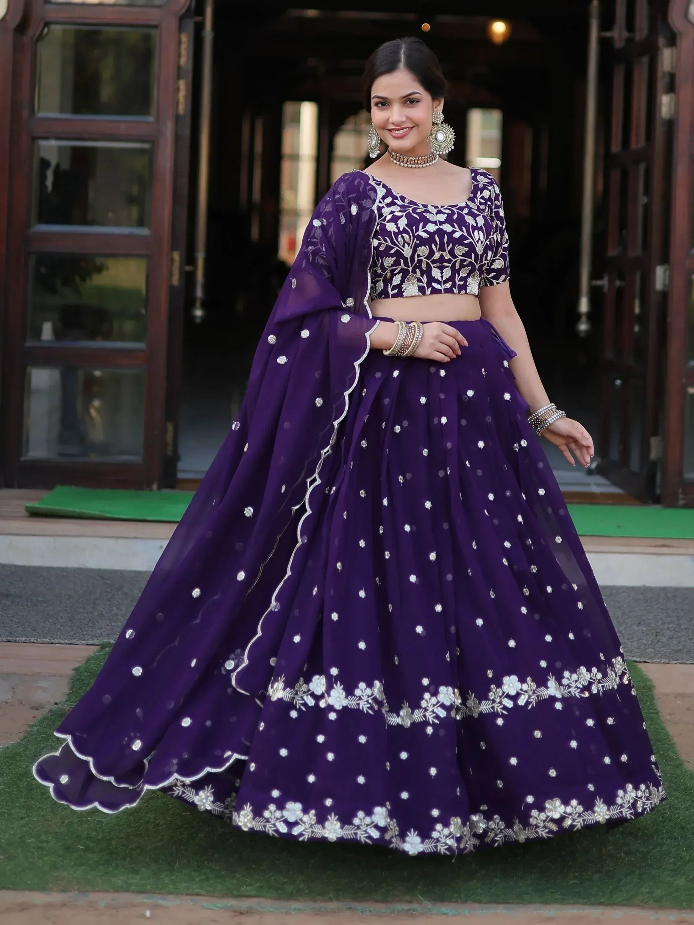 Purple embroidered lehenga choli with floral detailing, perfect for Indian ethnic wear occasions