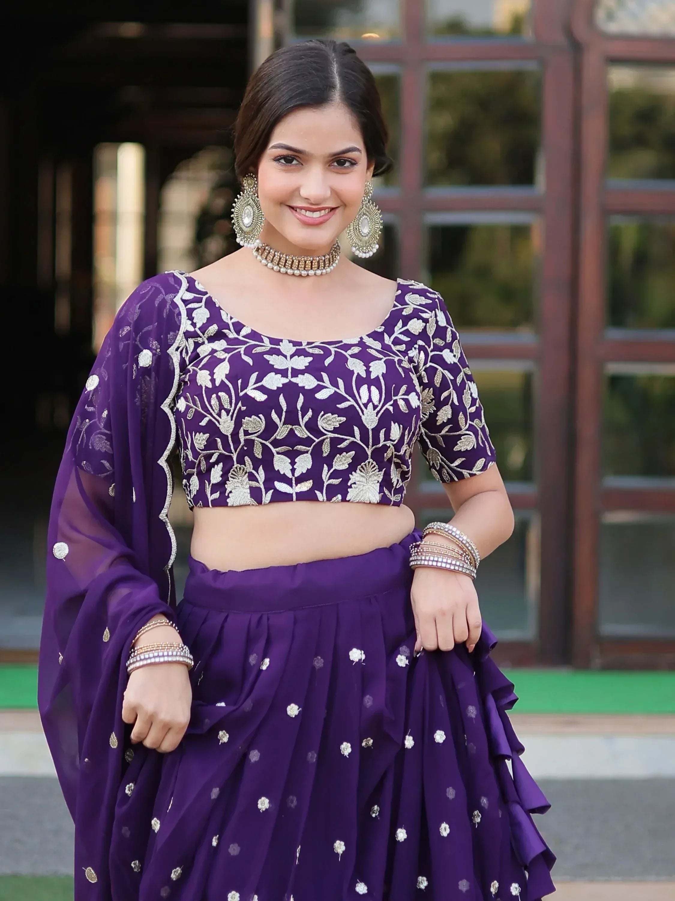 Purple embroidered lehenga choli with floral design, perfect for Indian ethnic wear occasions