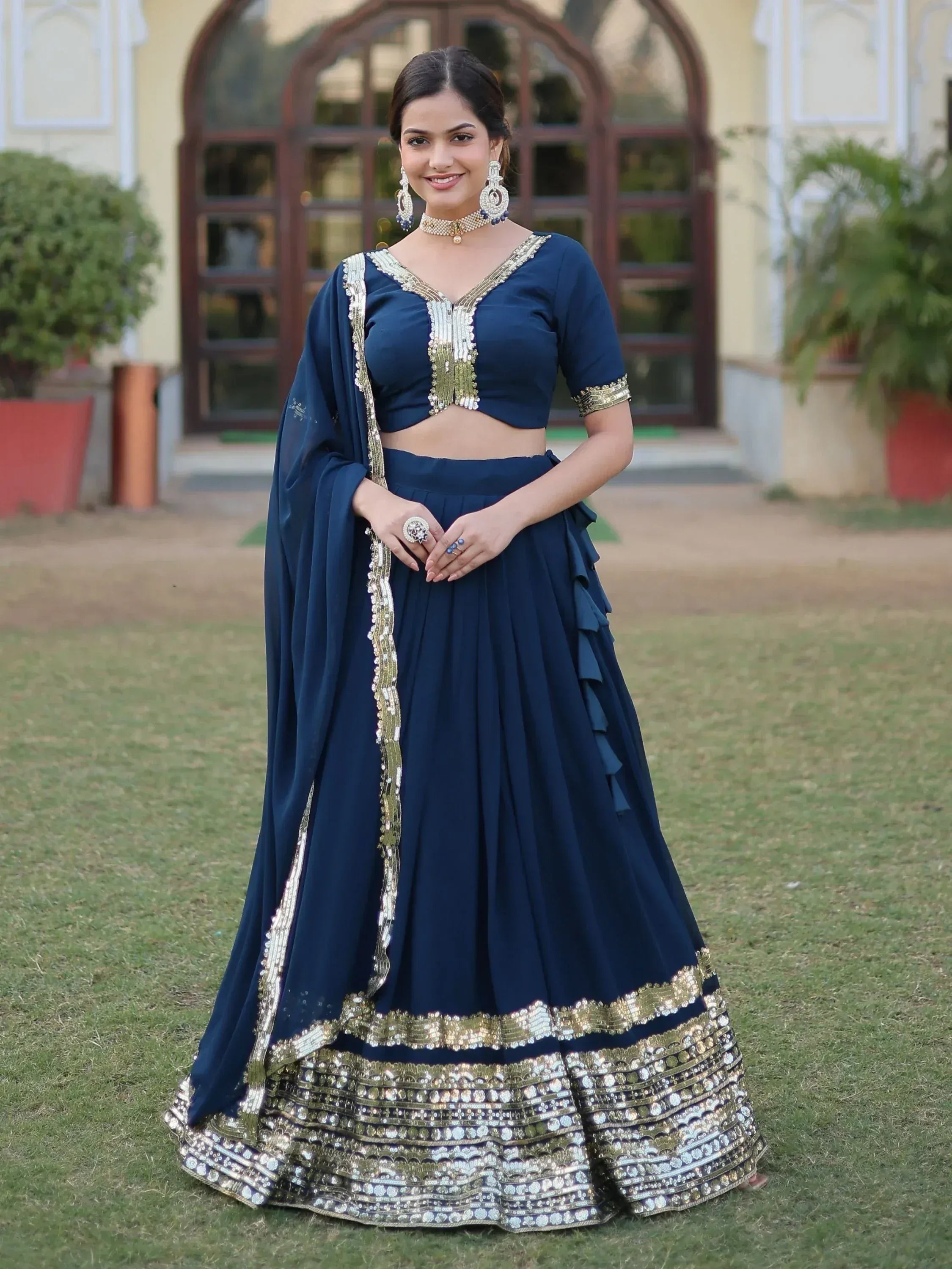 Navy blue designer lehenga choli with gold embroidery, perfect for Indian ethnic wear occasions
